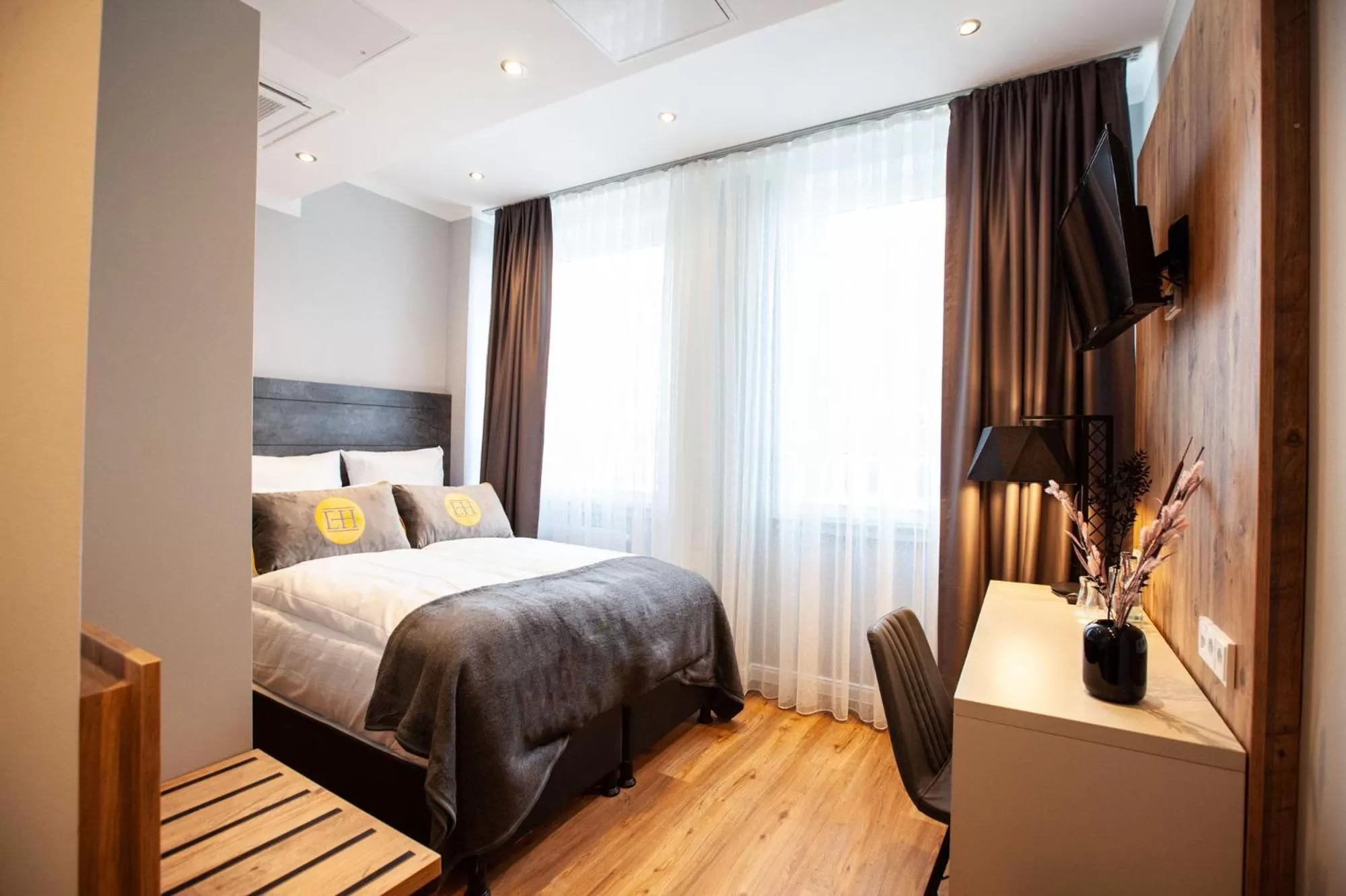 Bed in DORMERO Hotel Bremen