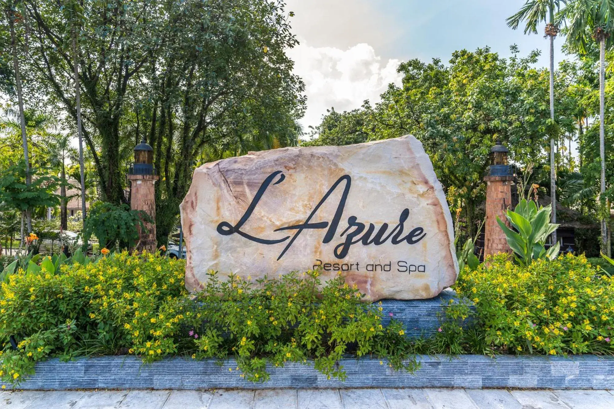 Property logo or sign in L'Azure Resort and Spa