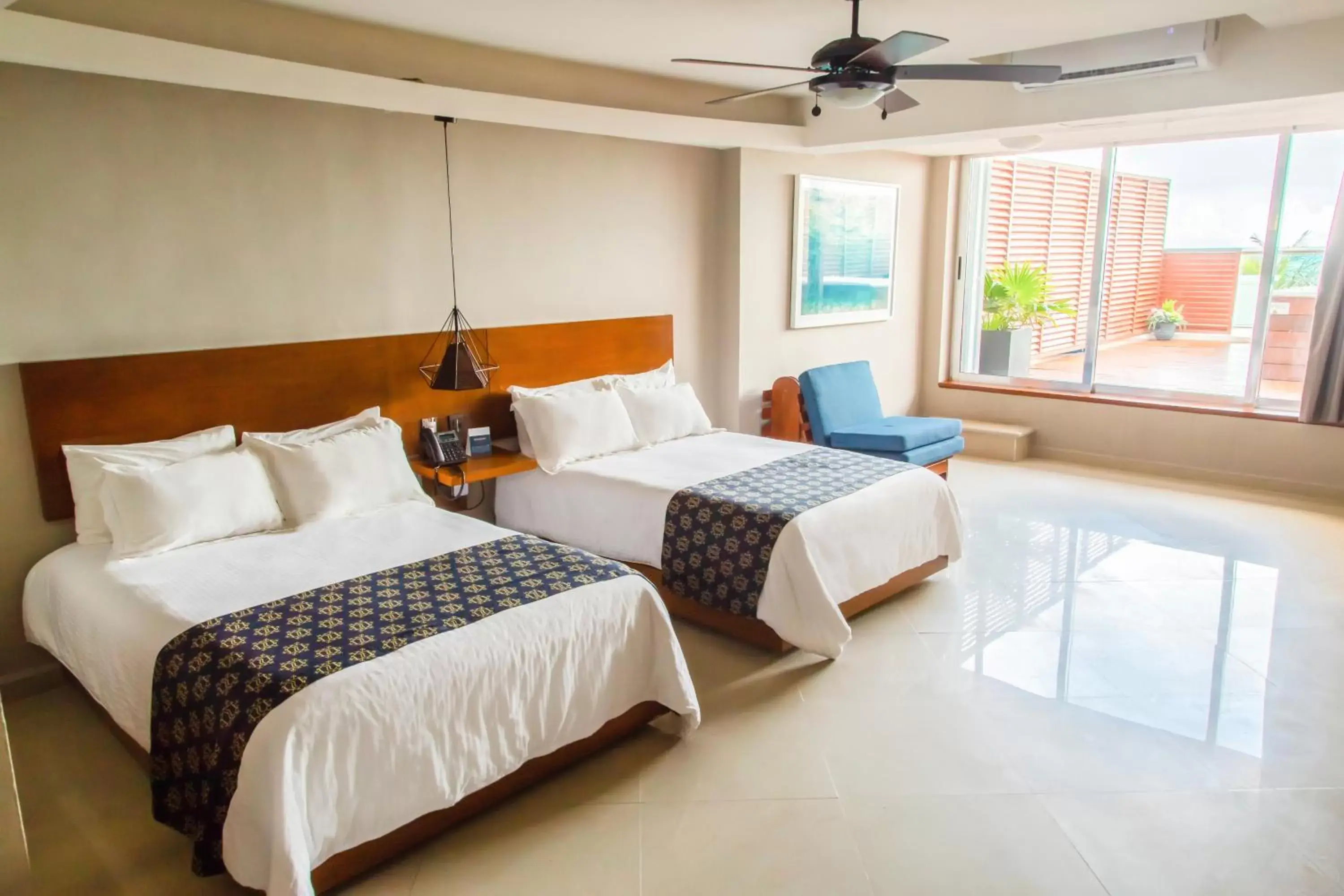 Bed in Ocean Dream Cancun by GuruHotel