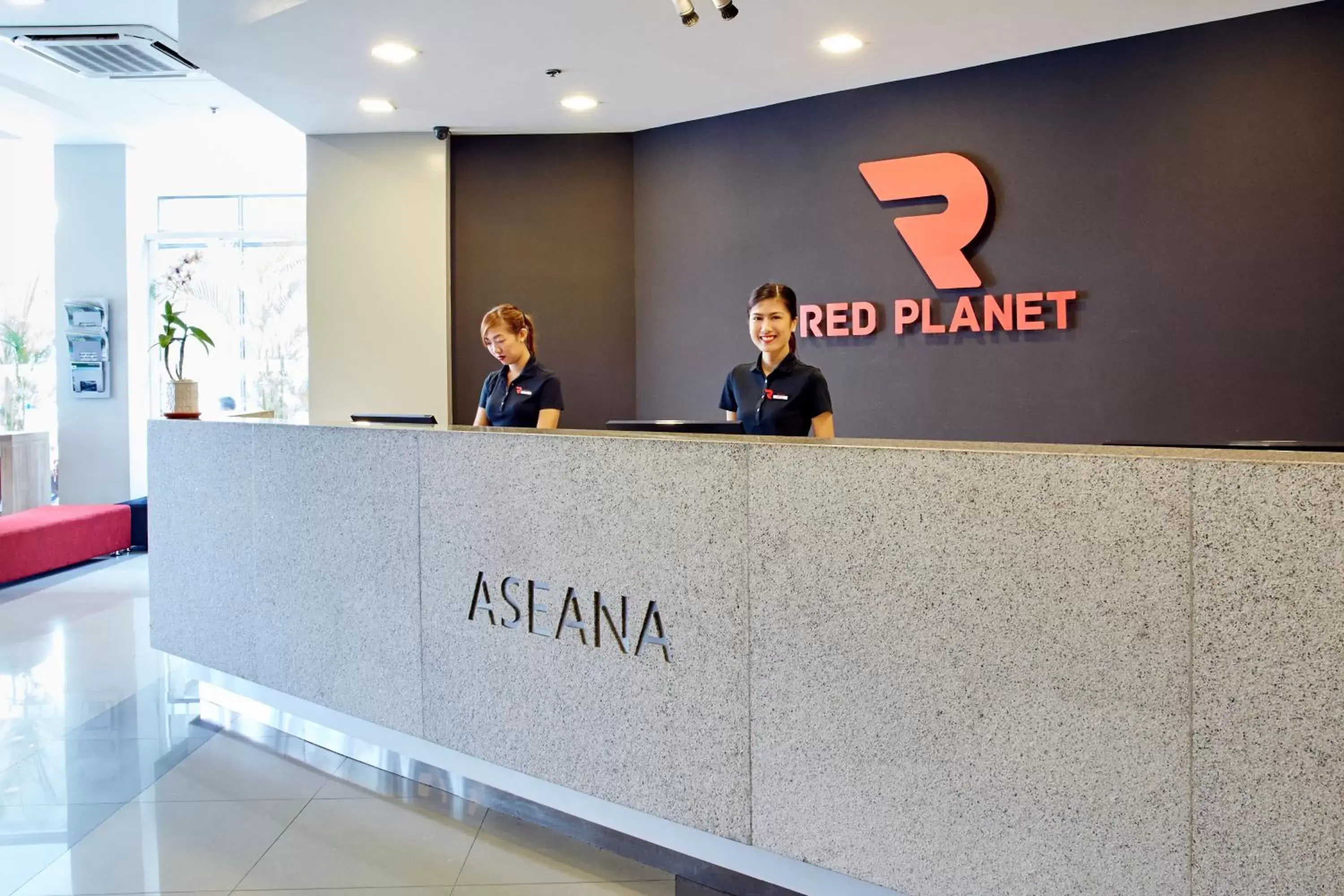 Staff, Lobby/Reception in Red Planet Manila Aseana City