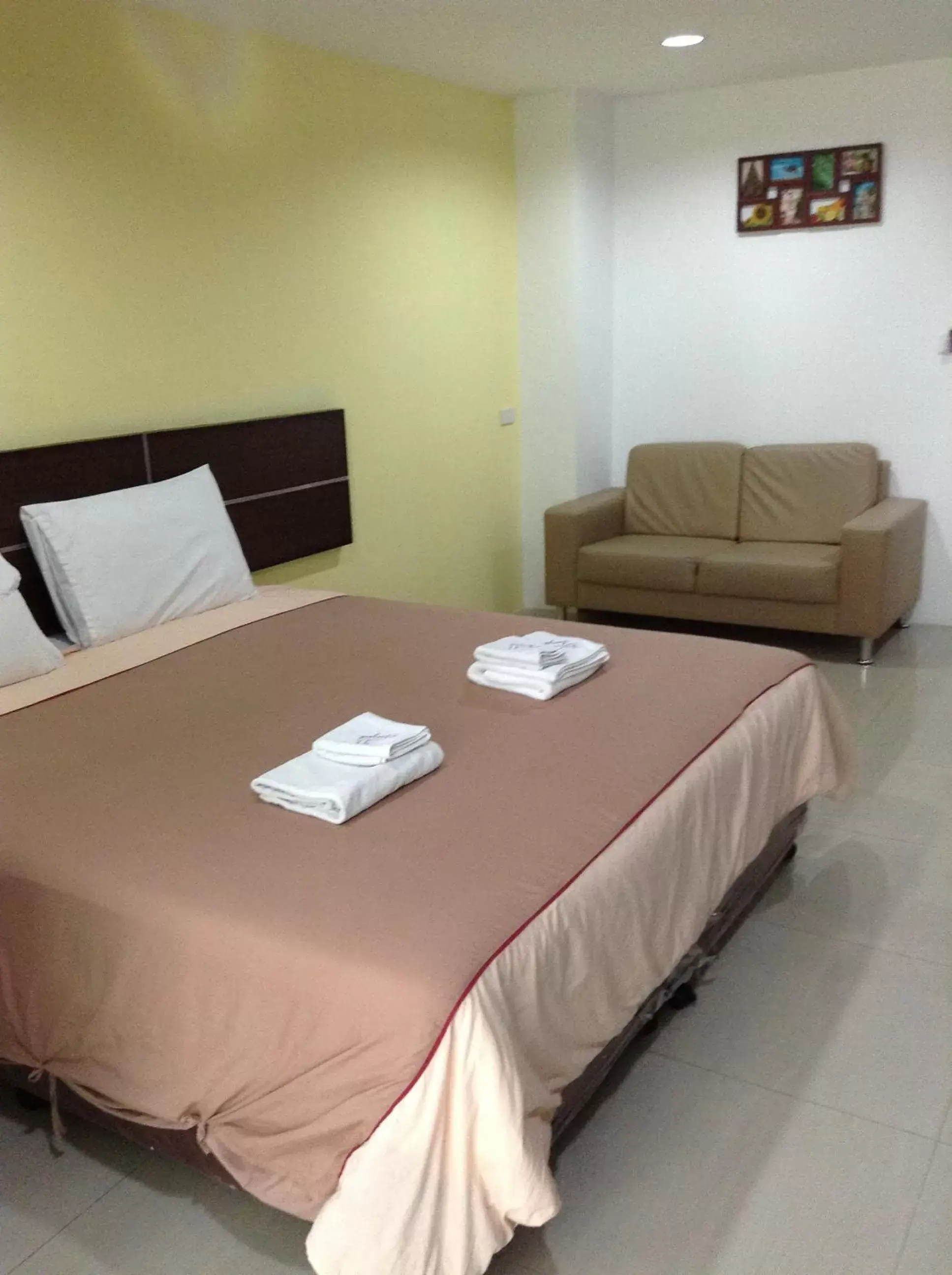 Bed in Diamond Bangkok Apartment