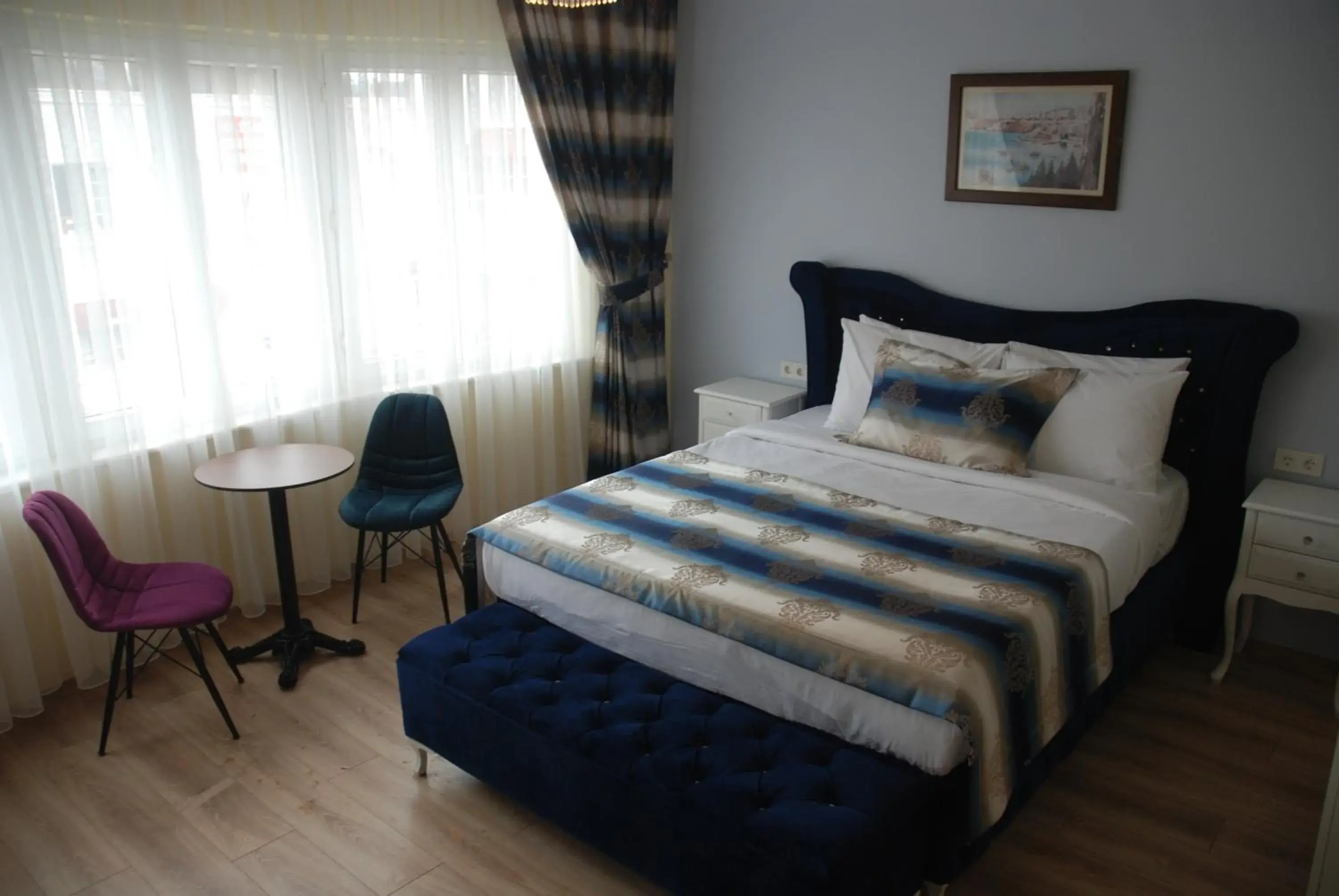 Bed in La Mer Boutique Hotel & Guesthouse