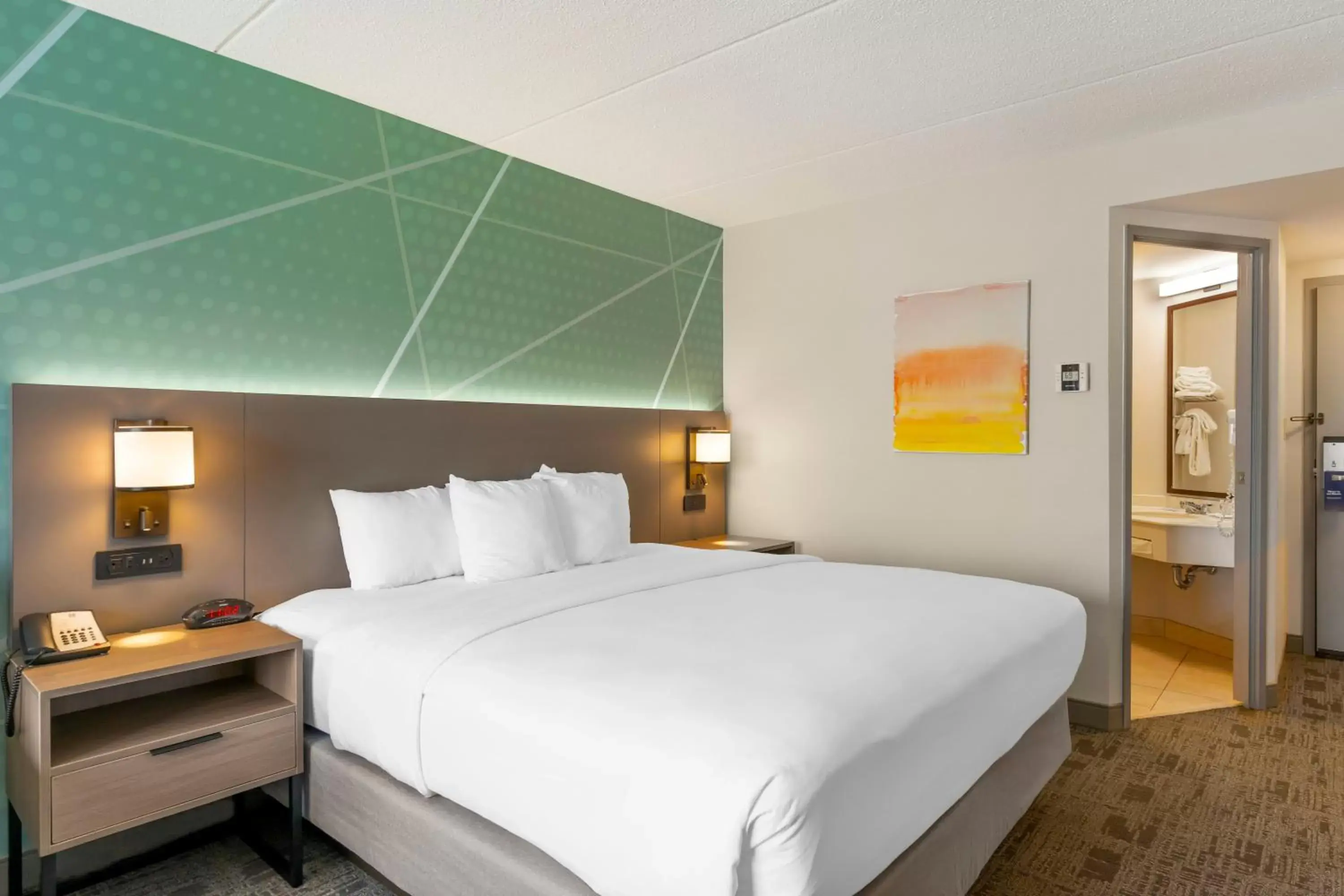 Bed in Comfort Inn & Suites Watertown