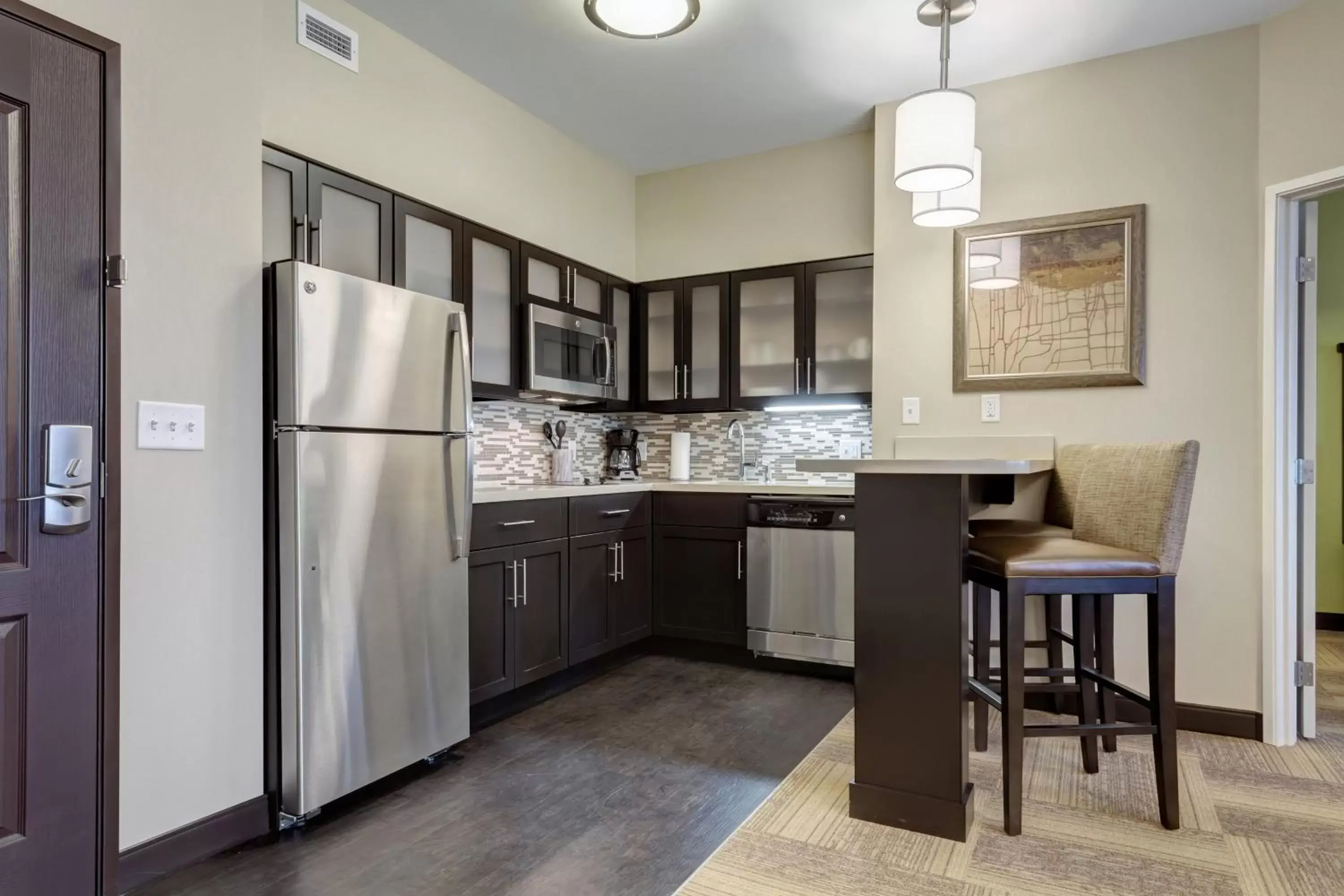 Photo of the whole room, Kitchen/Kitchenette in Staybridge Suites St Louis - Westport, an IHG hotel