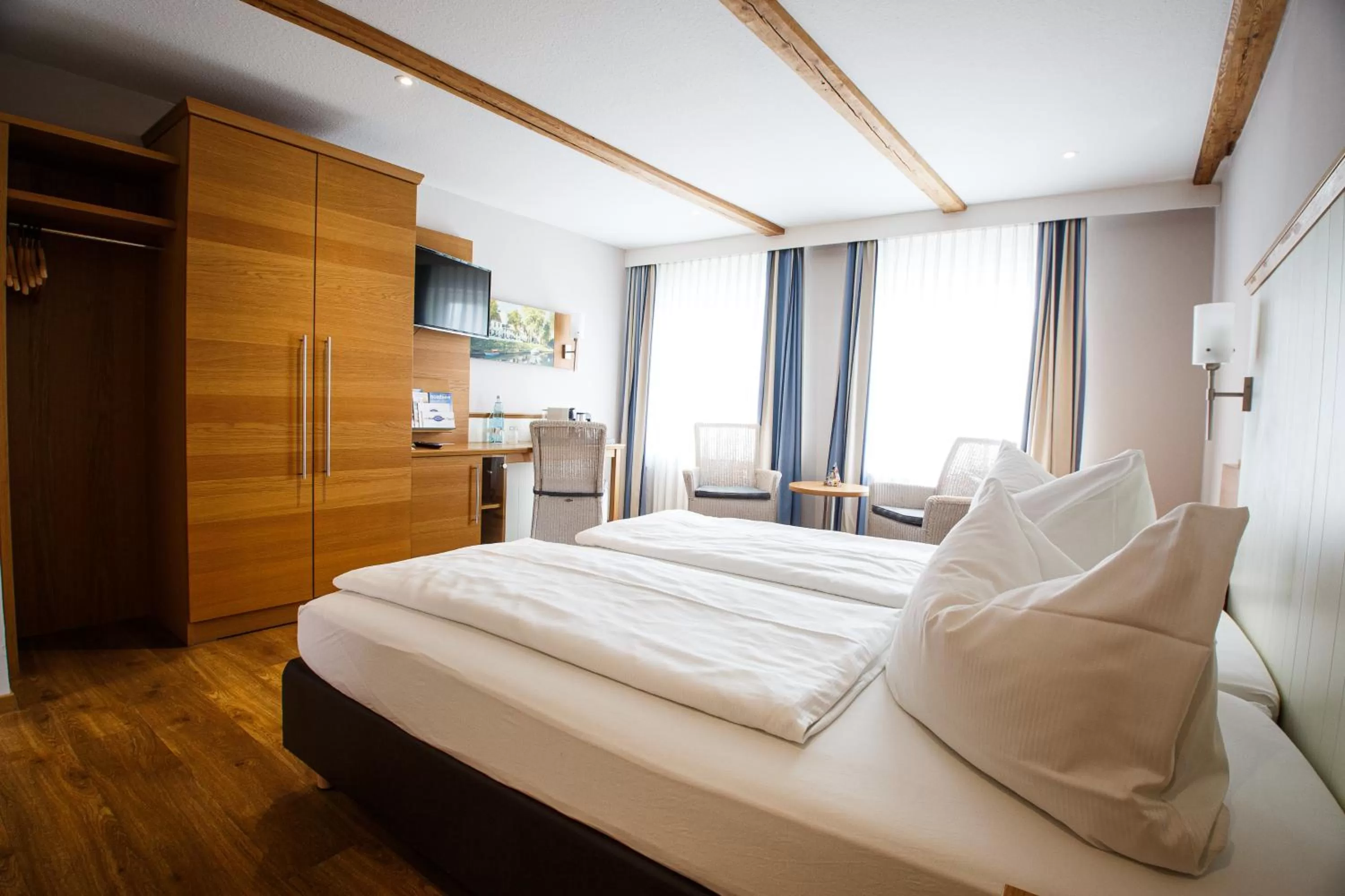 Bed in Romantik Hotel Aquarium