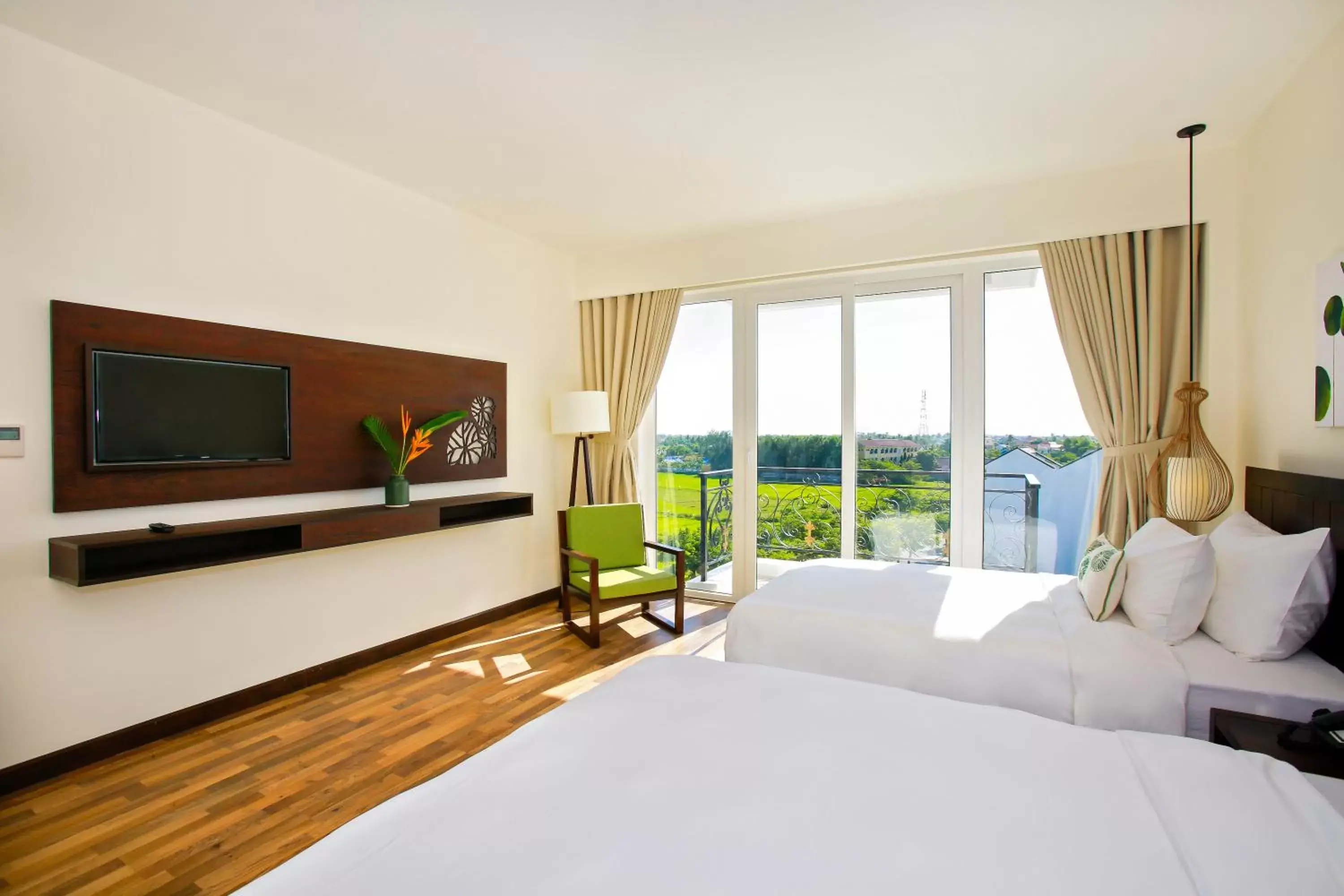 Deluxe Triple Room with Balcony in Lasenta Boutique Hotel Hoian