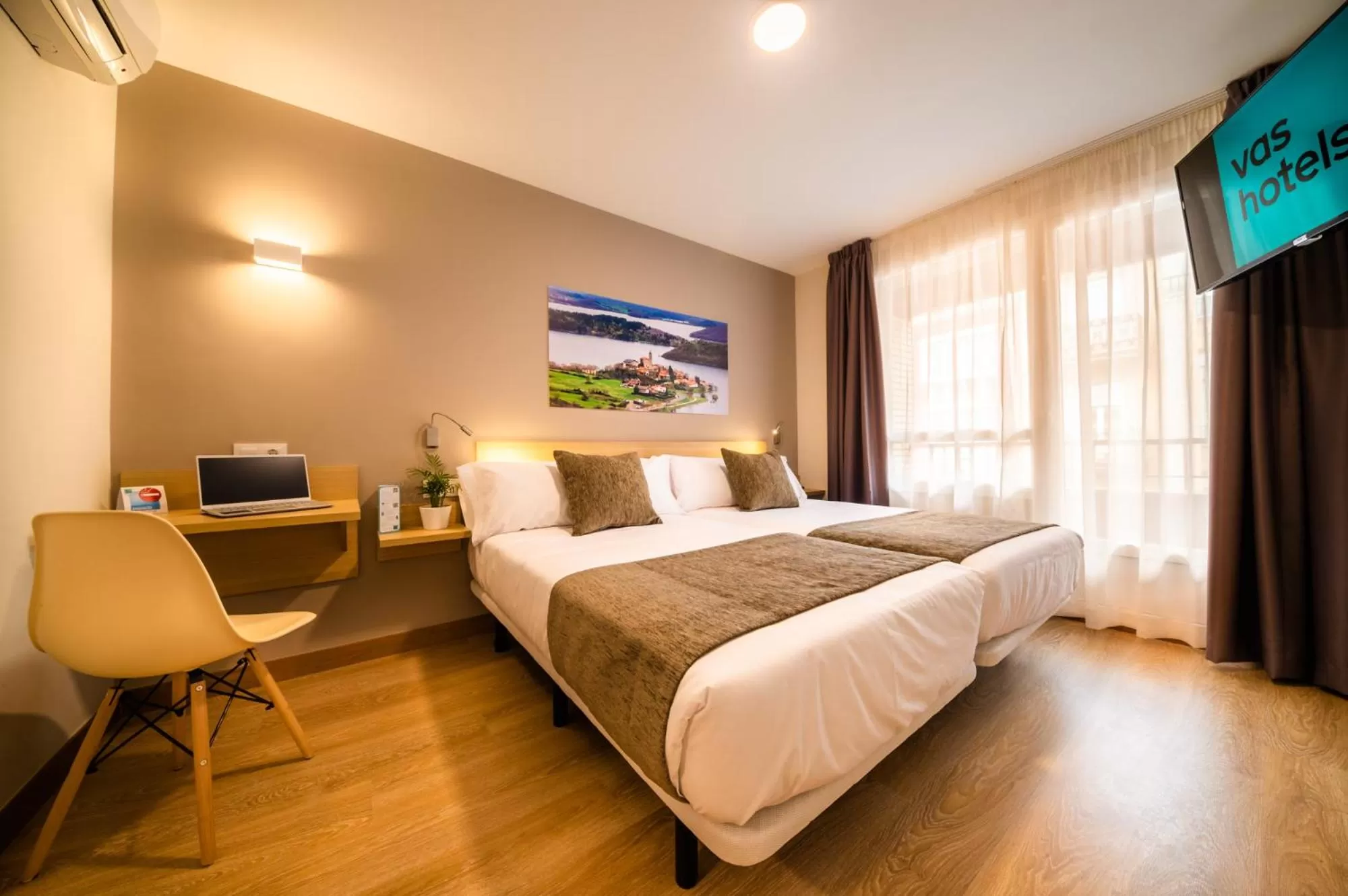 Bed in Hotel Vas Vitoria AutoCheckIn