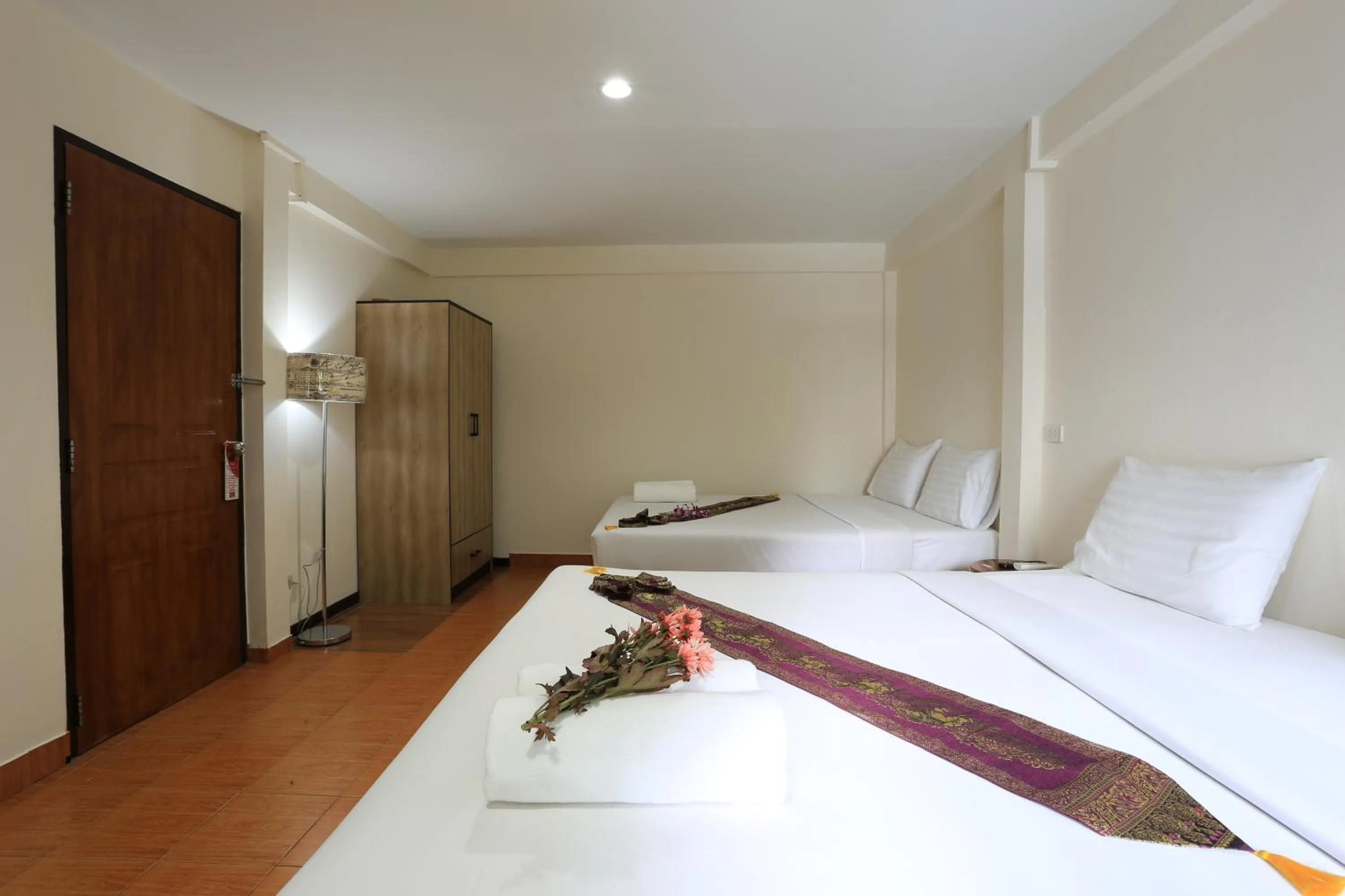 Bed in The Siam Guest House - SHA Extra Plus