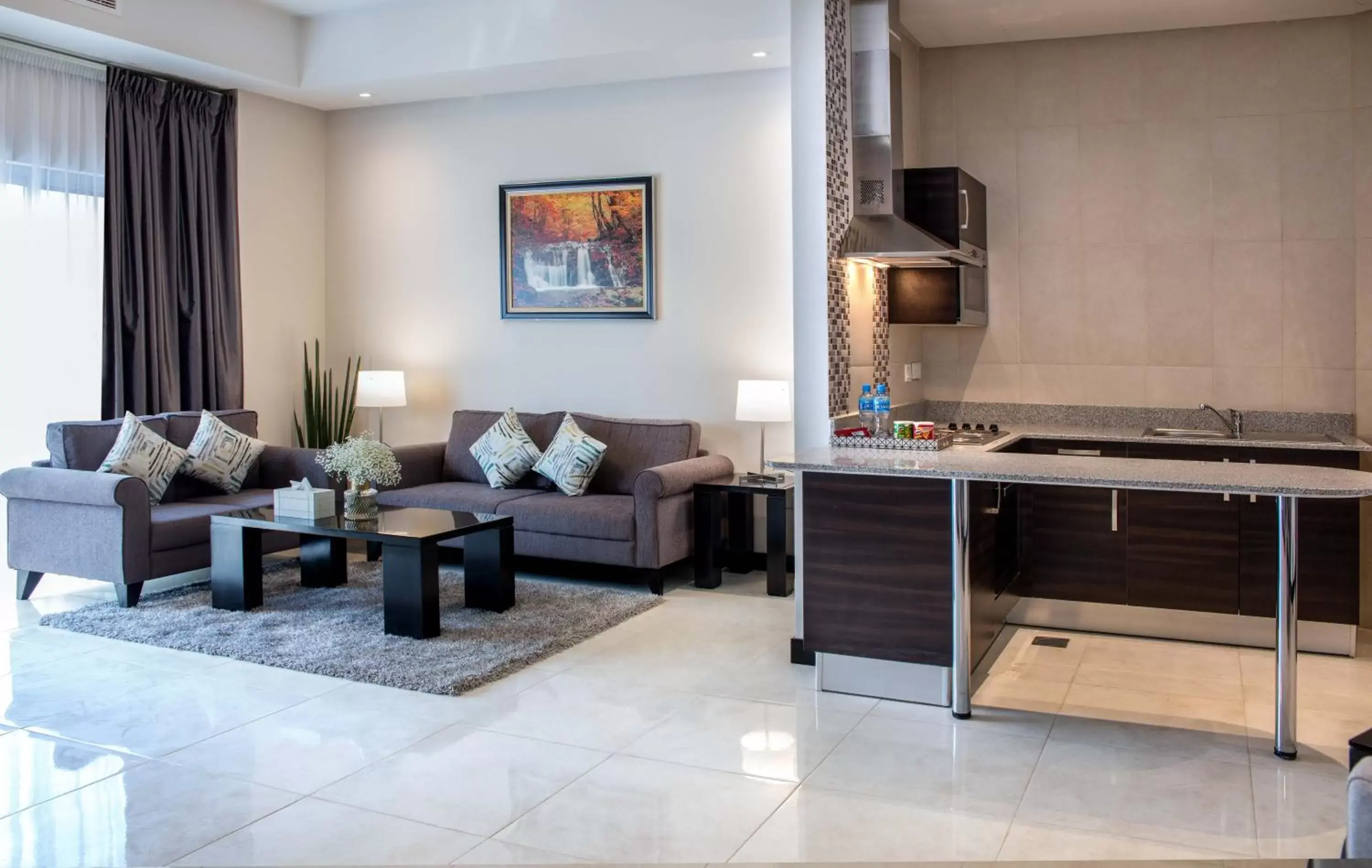 TV and multimedia, Kitchen/Kitchenette in Loumage Suites and Spa