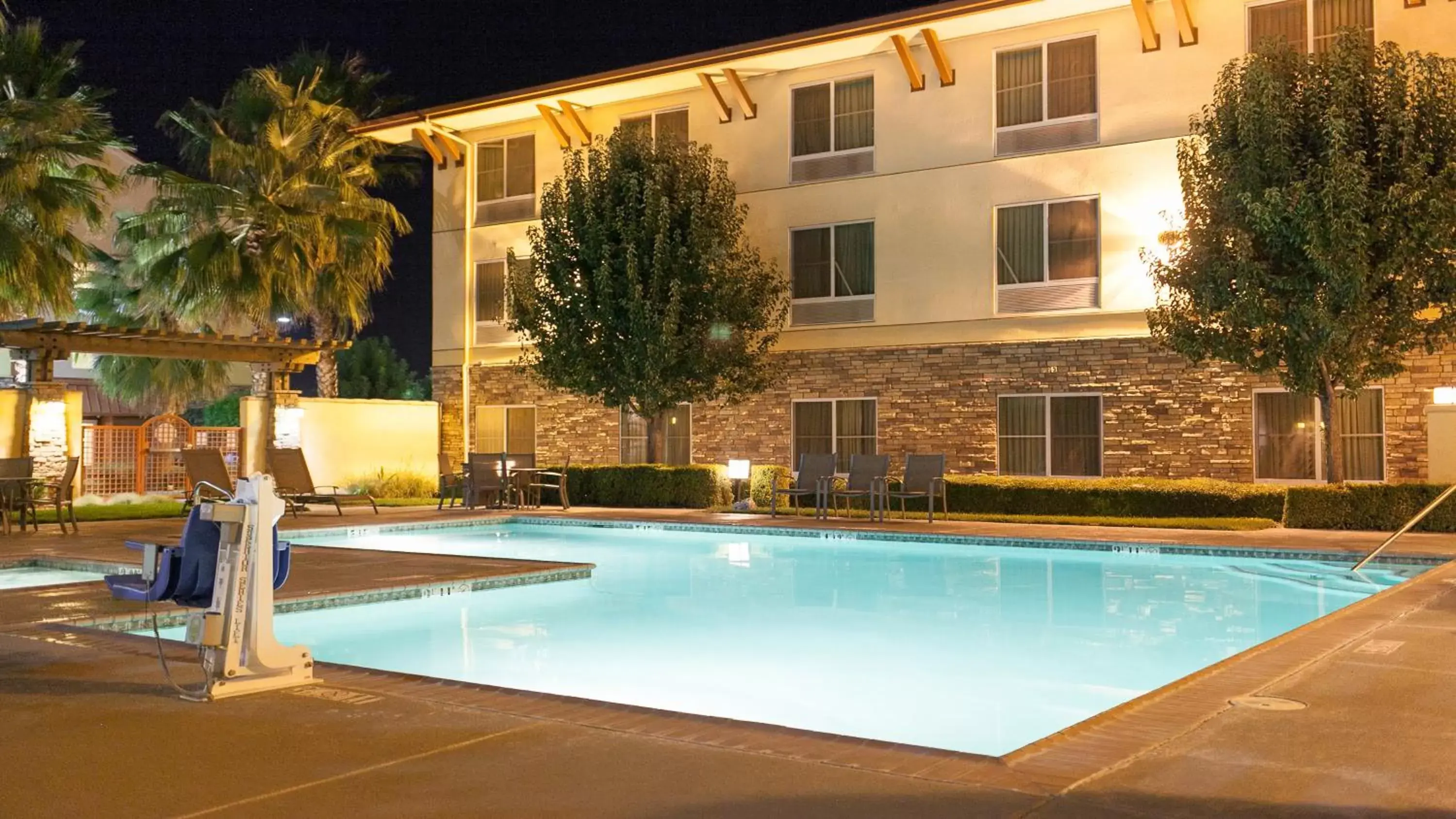 Swimming pool, Property Building in Holiday Inn Express Turlock, an IHG Hotel