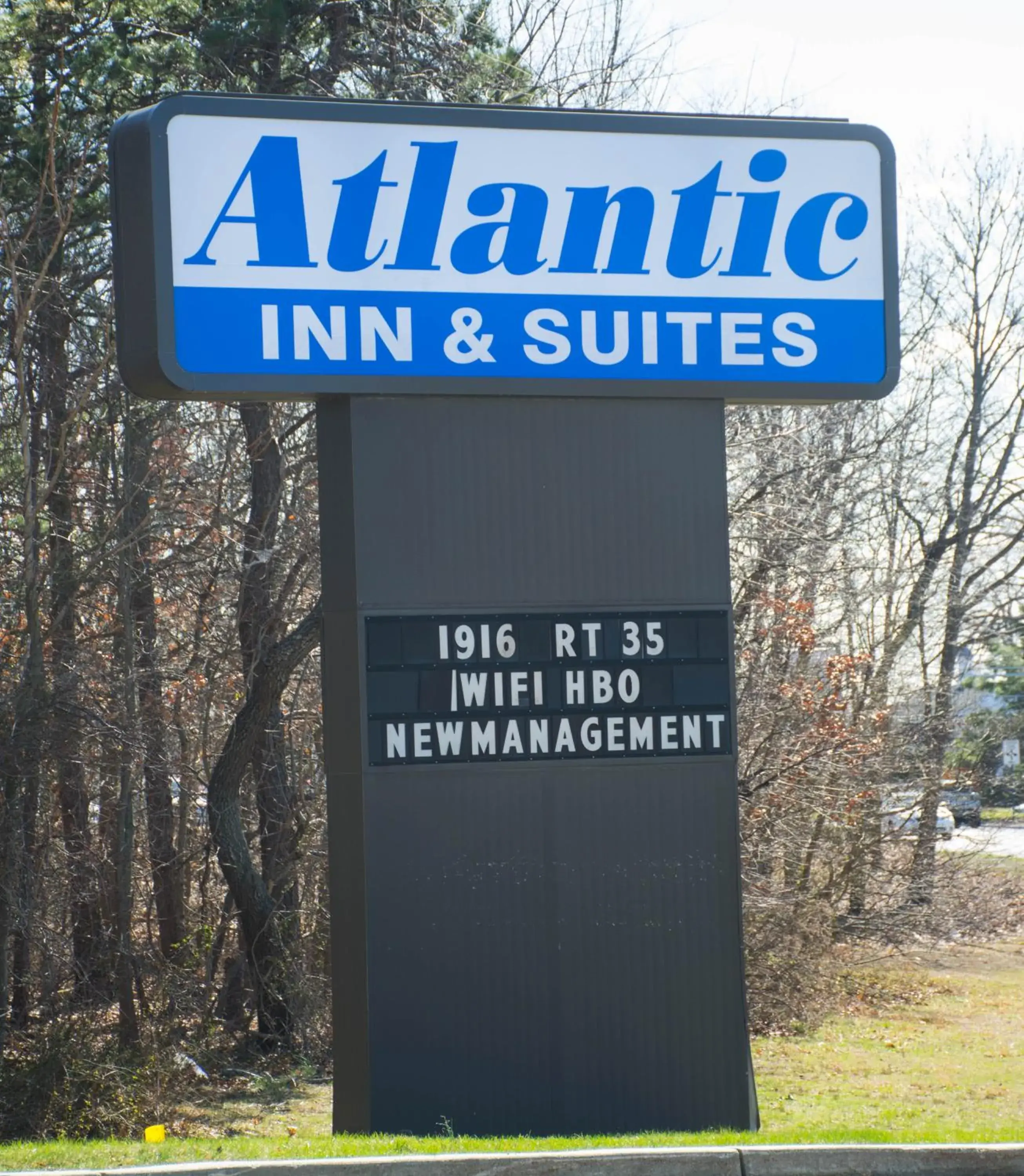 Property logo or sign in Atlantic Inn and Suites - Wall Township