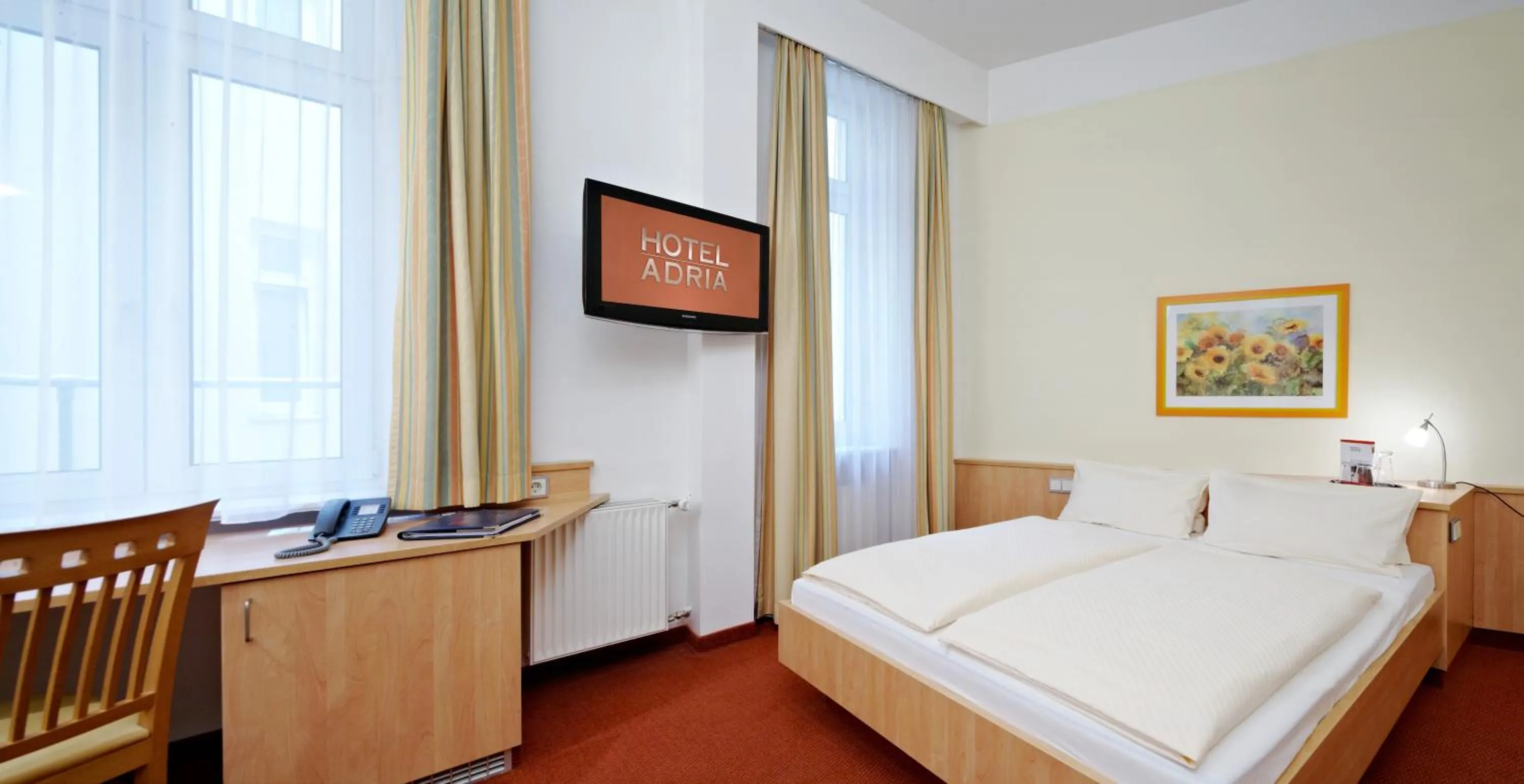 Photo of the whole room, Bed in Hotel ADRIA München