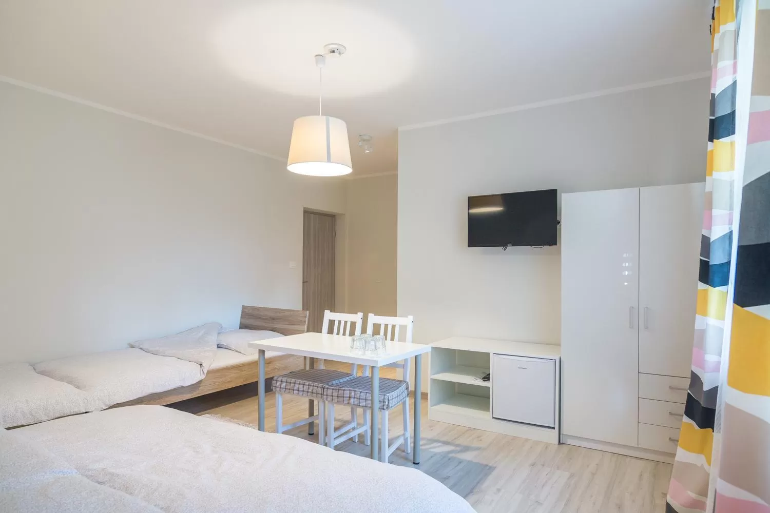 TV and multimedia, Bed in HOP HOUSE Garni Hotel