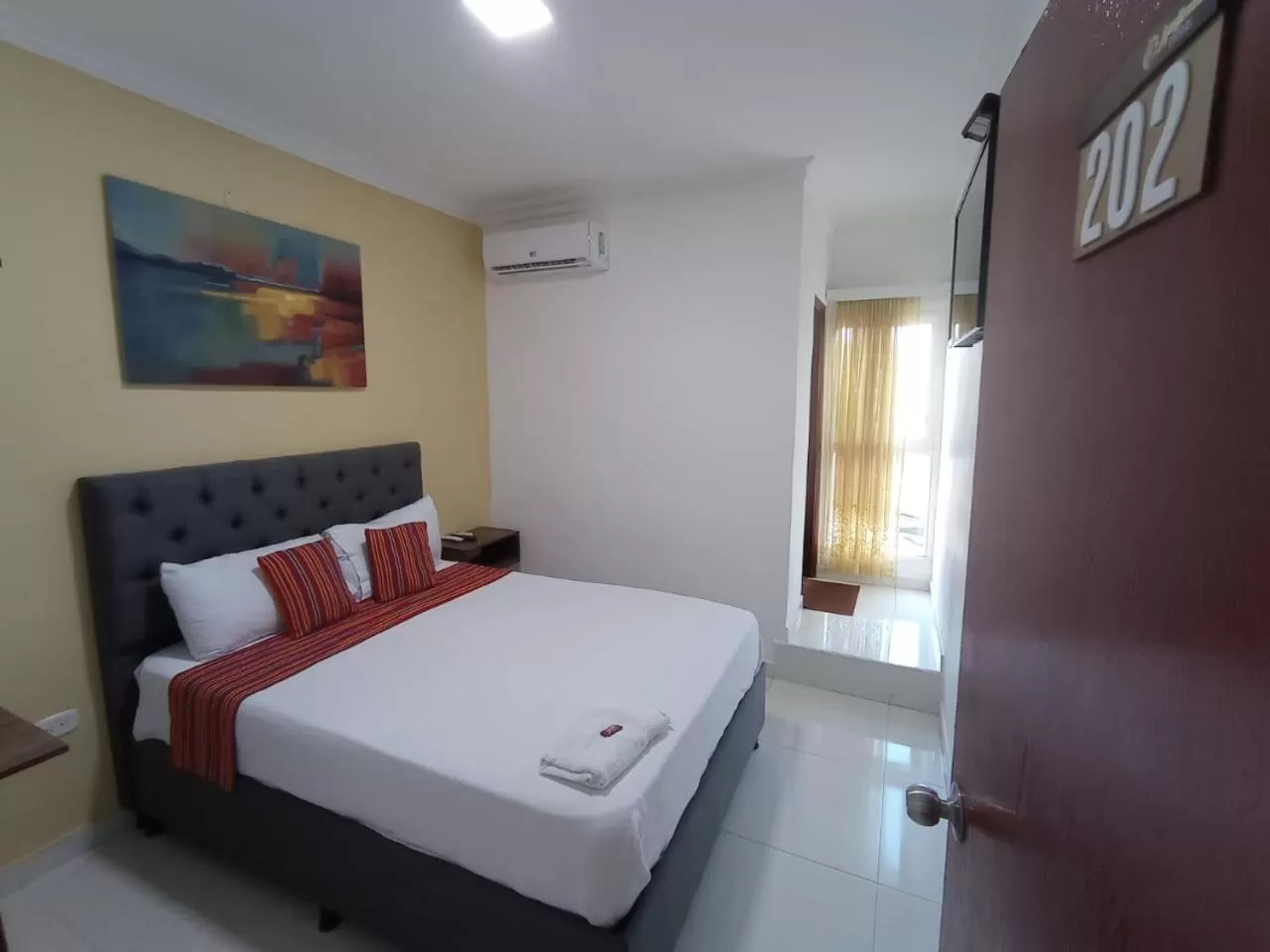 Bed in ANAJIRAWAA HOTEL