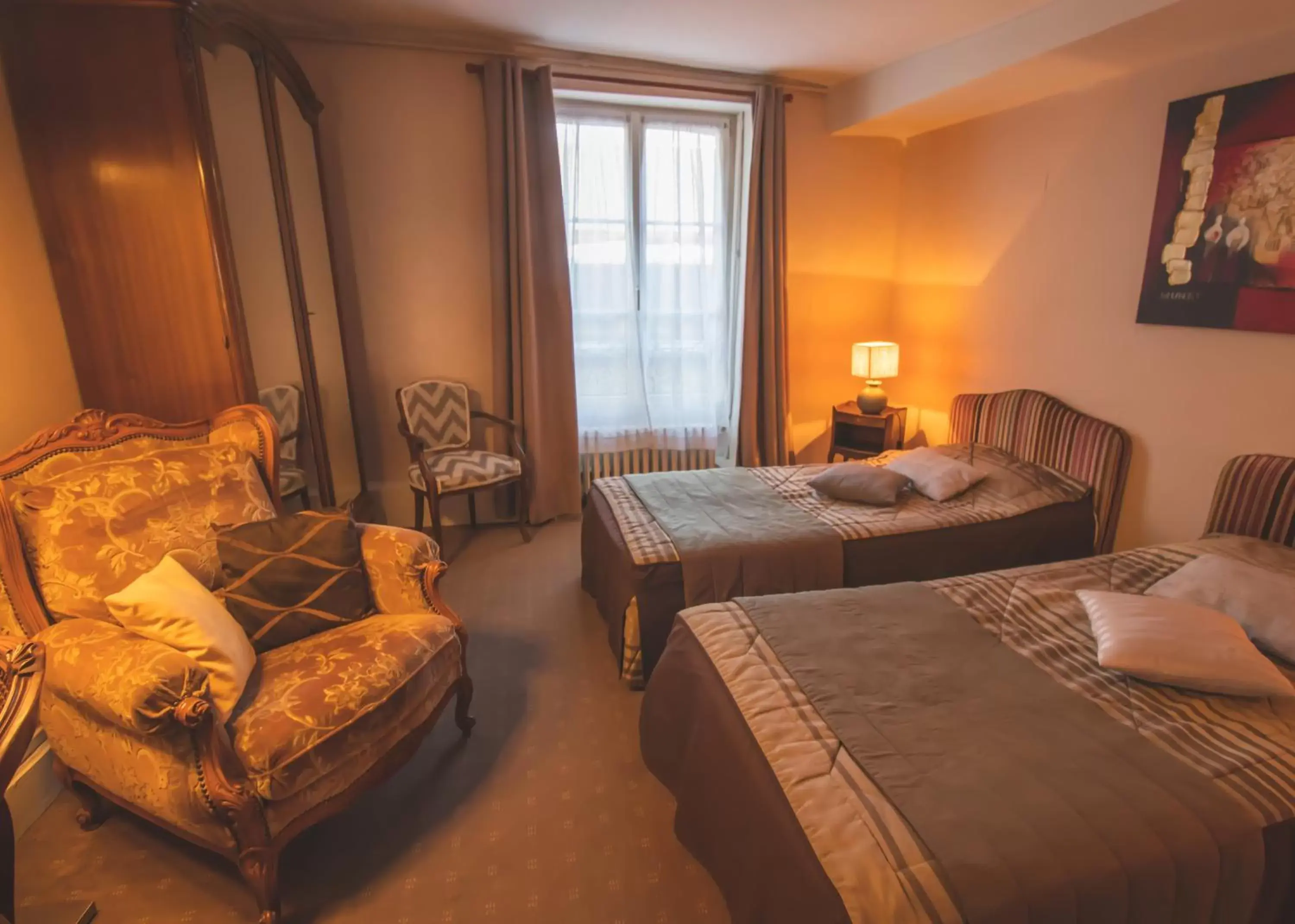 Photo of the whole room, Bed in Hôtel De La Banniere De France