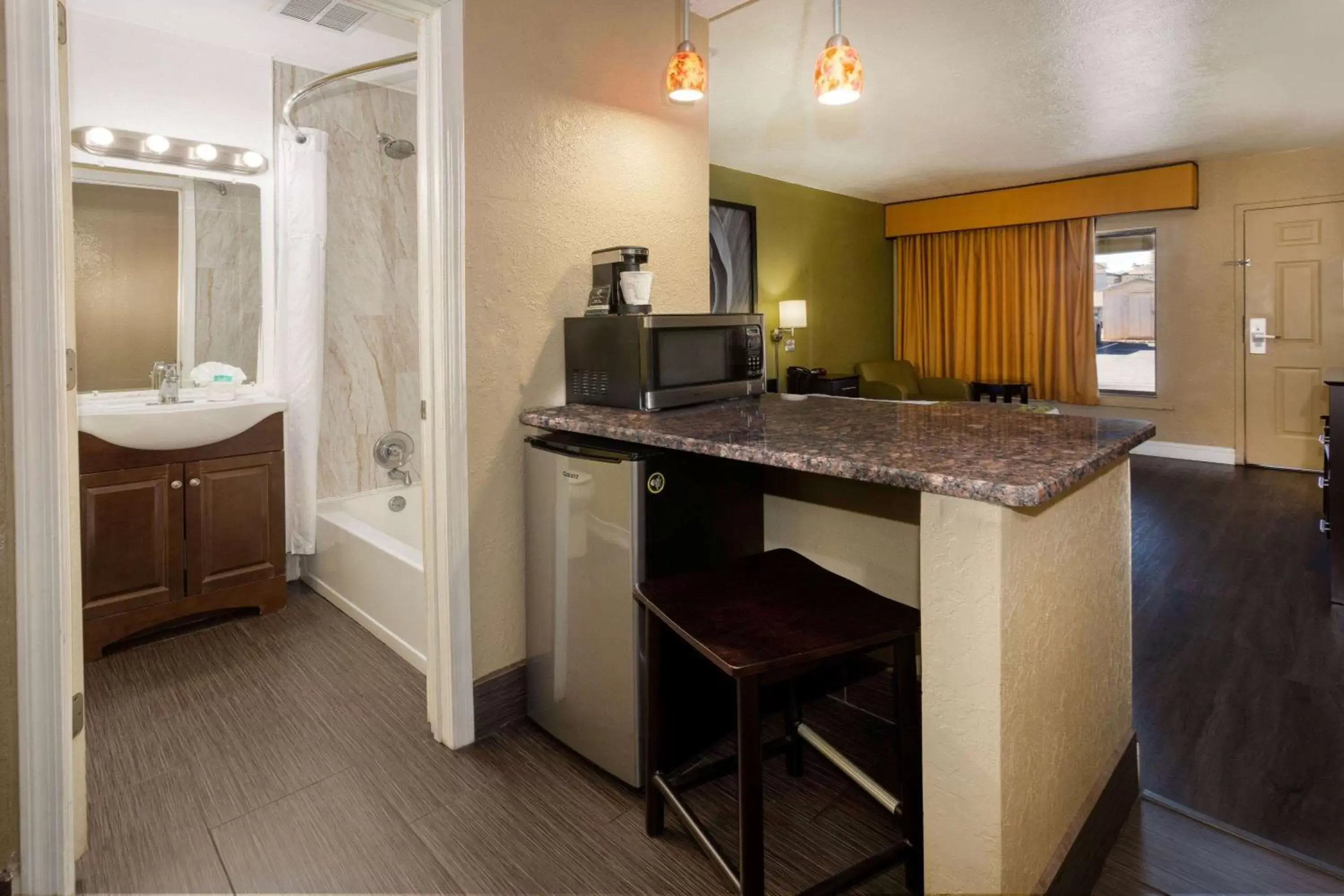 Photo of the whole room, Bathroom in Super 8 by Wyndham NAU/Downtown Conference Center