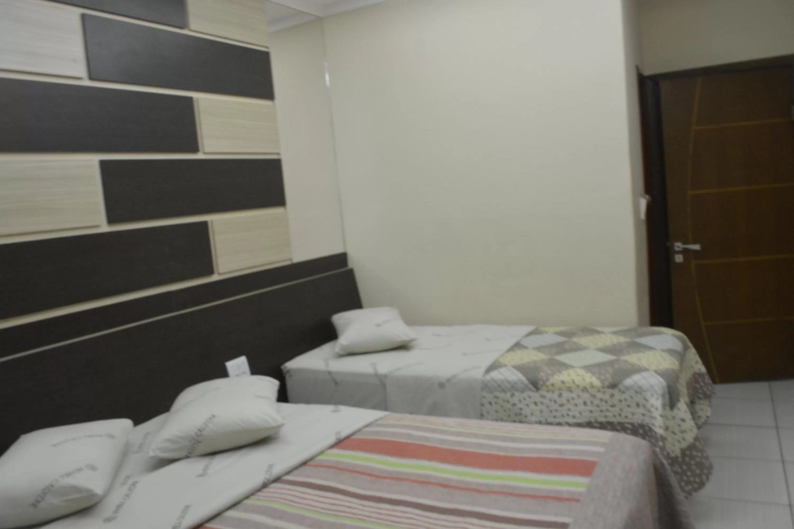 Bed in Hotel Calstar