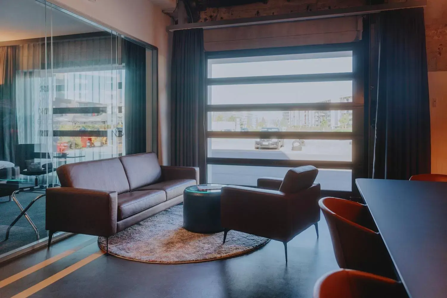 Living room, Seating Area in V8 Hotel Köln at MOTORWORLD