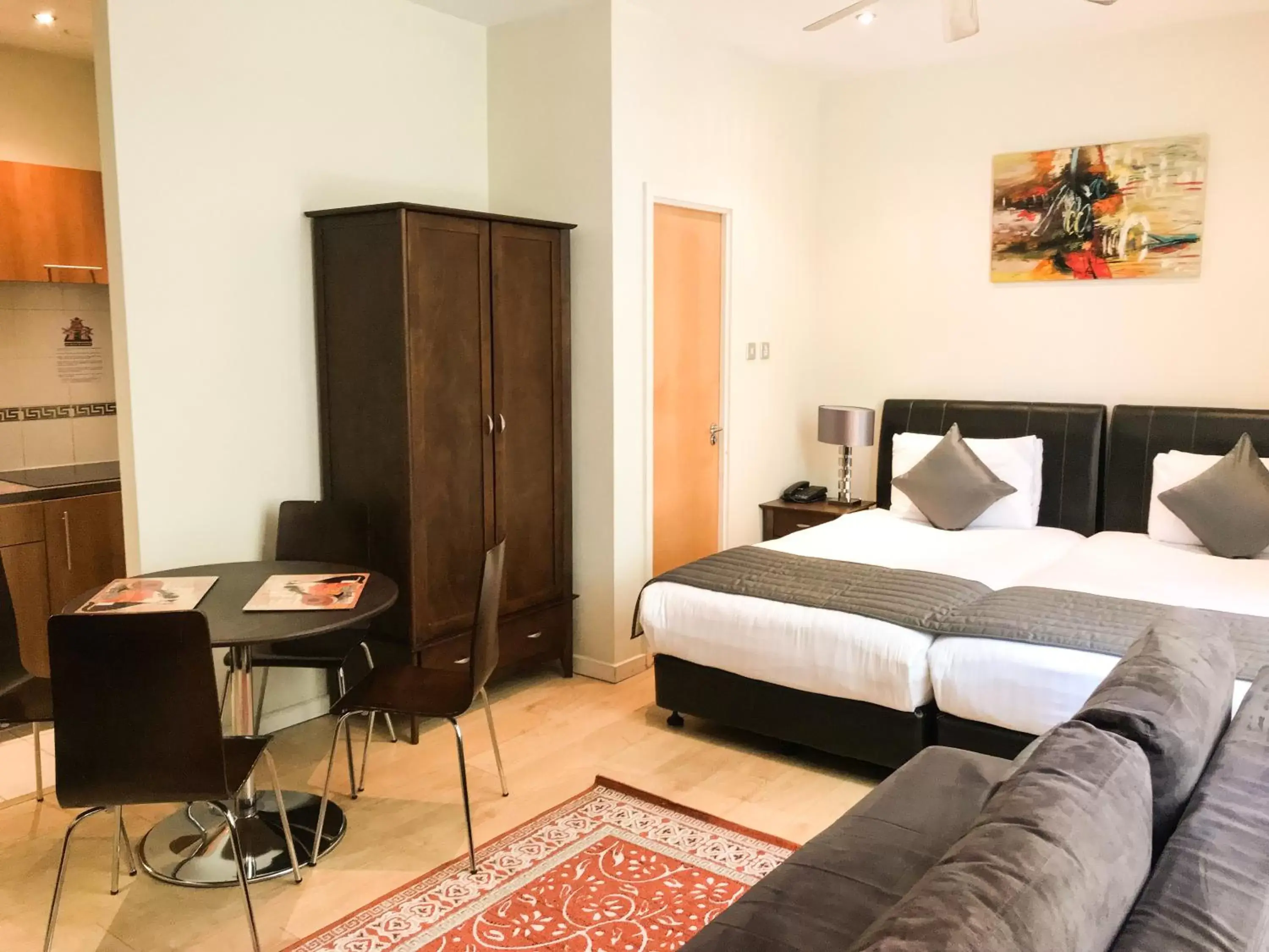 Living room, Bed in Grand Plaza Serviced Apartments