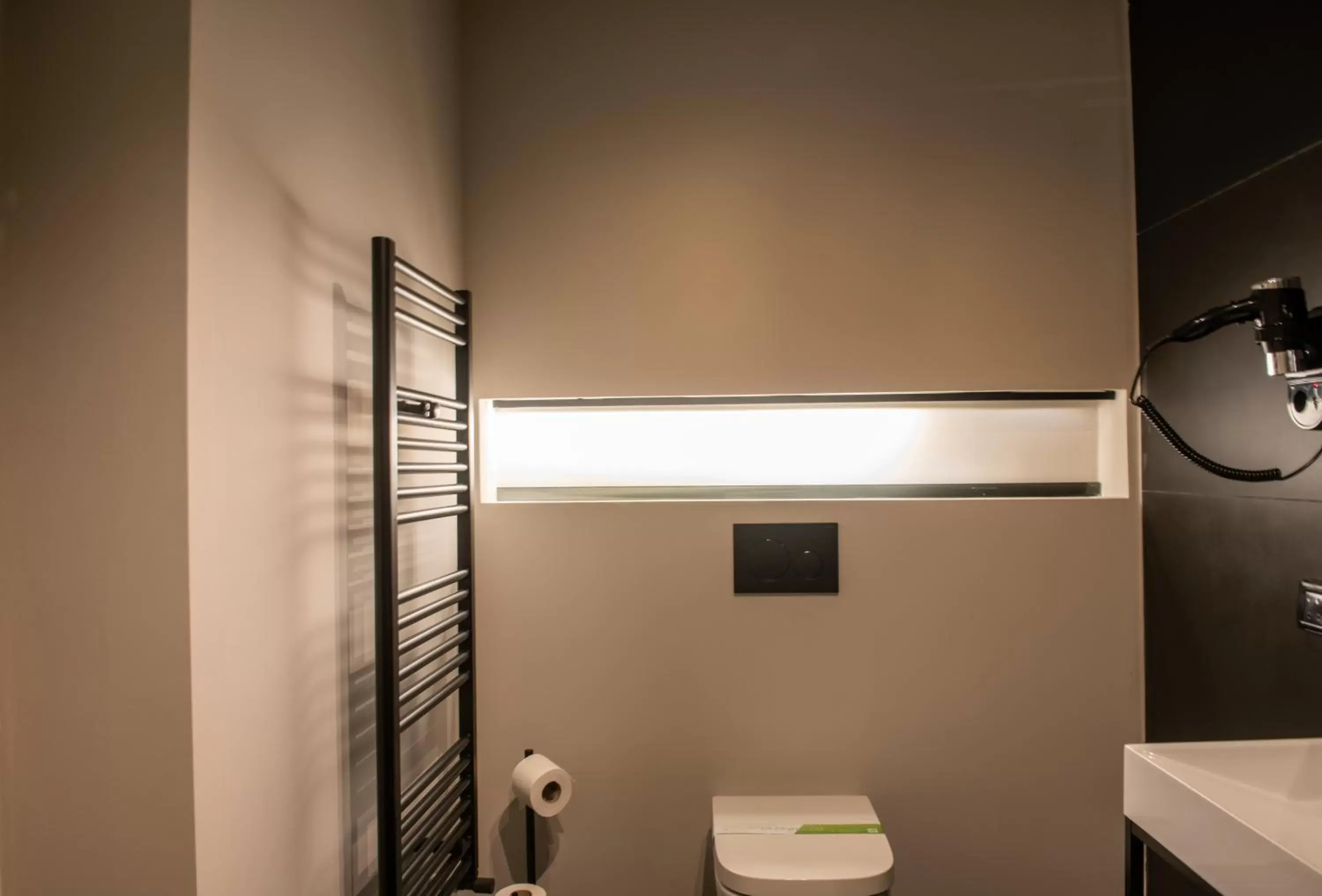 Bathroom in Bucharest Comfort Suites Hotel