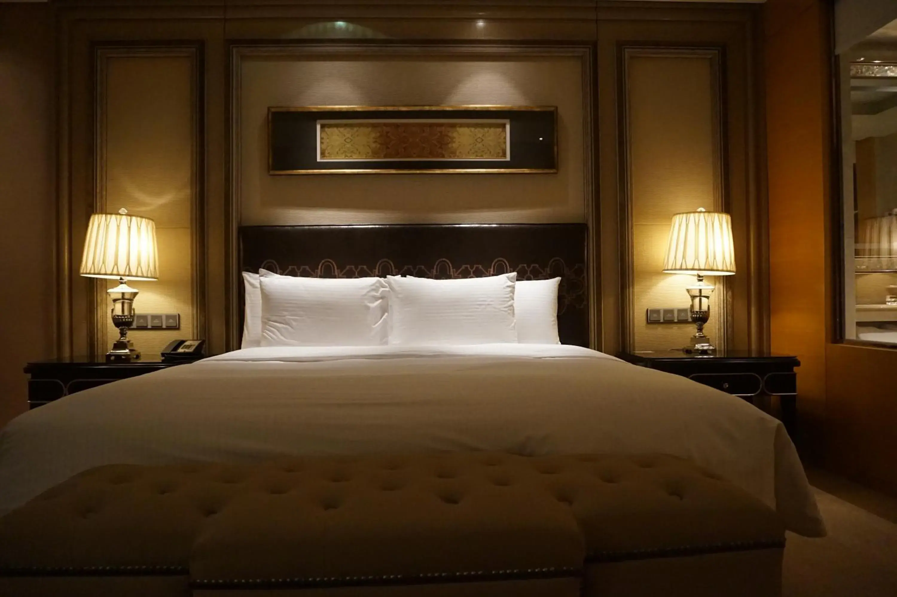 Bed in Wanda Realm Harbin Hotel