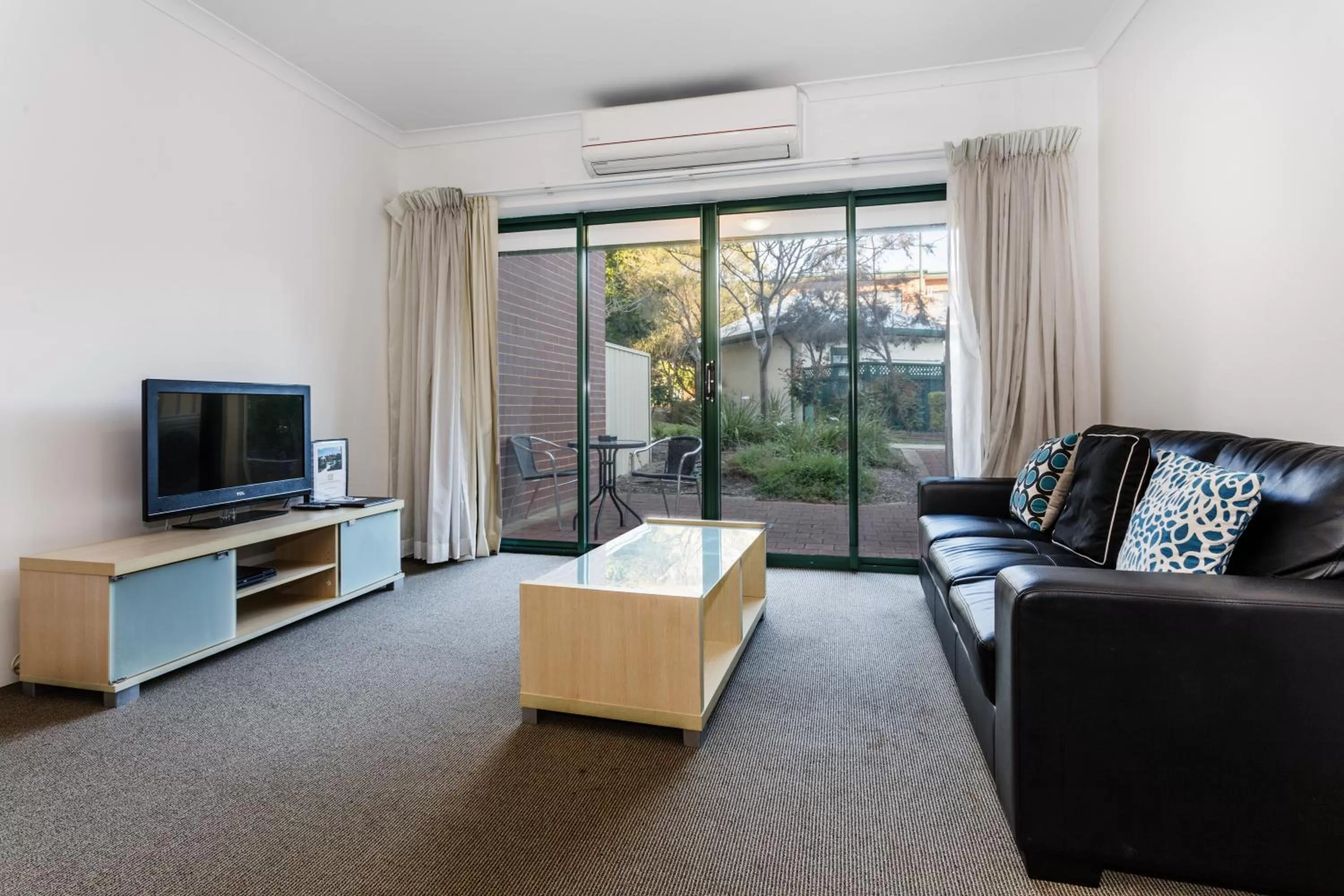 Living room in Perth Ascot Central Apartment Hotel Official