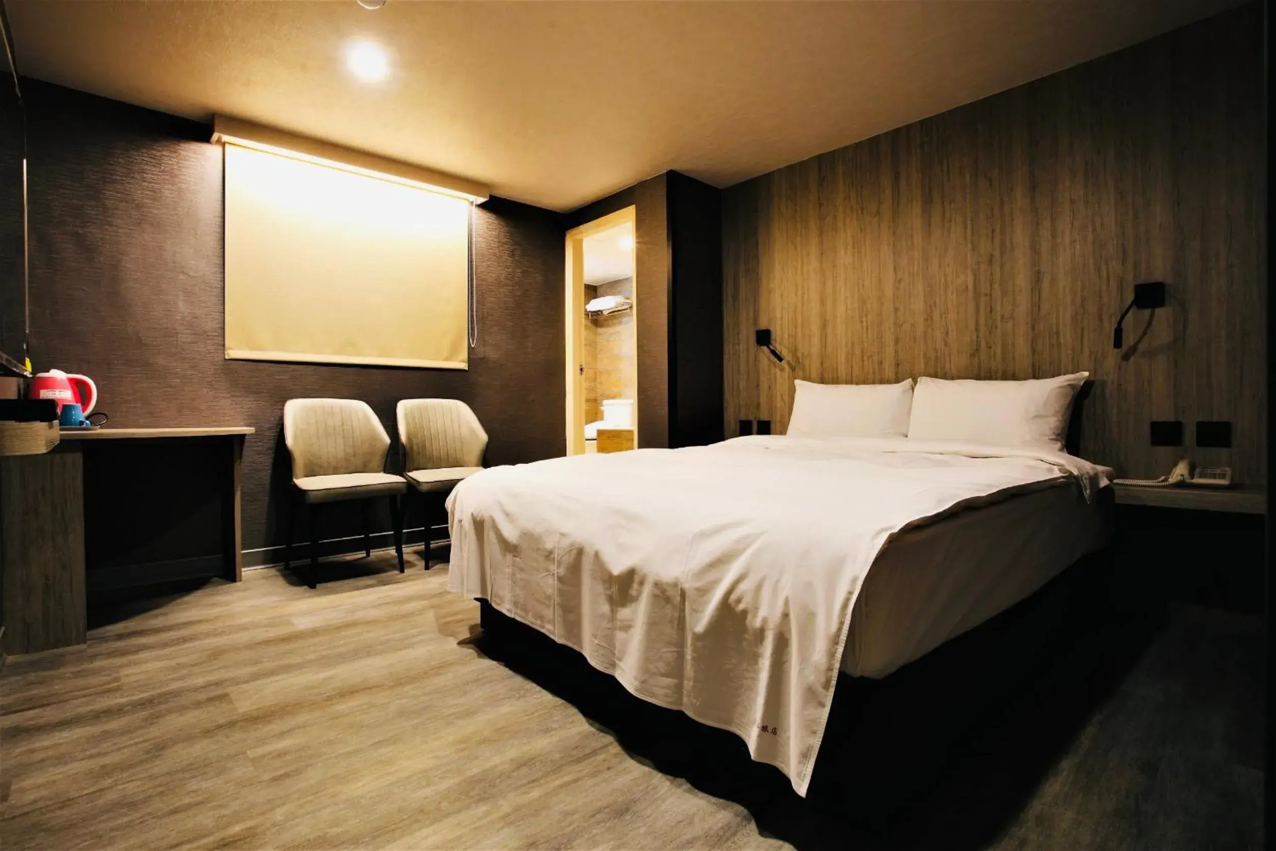Bed in Goldenhome Hotel