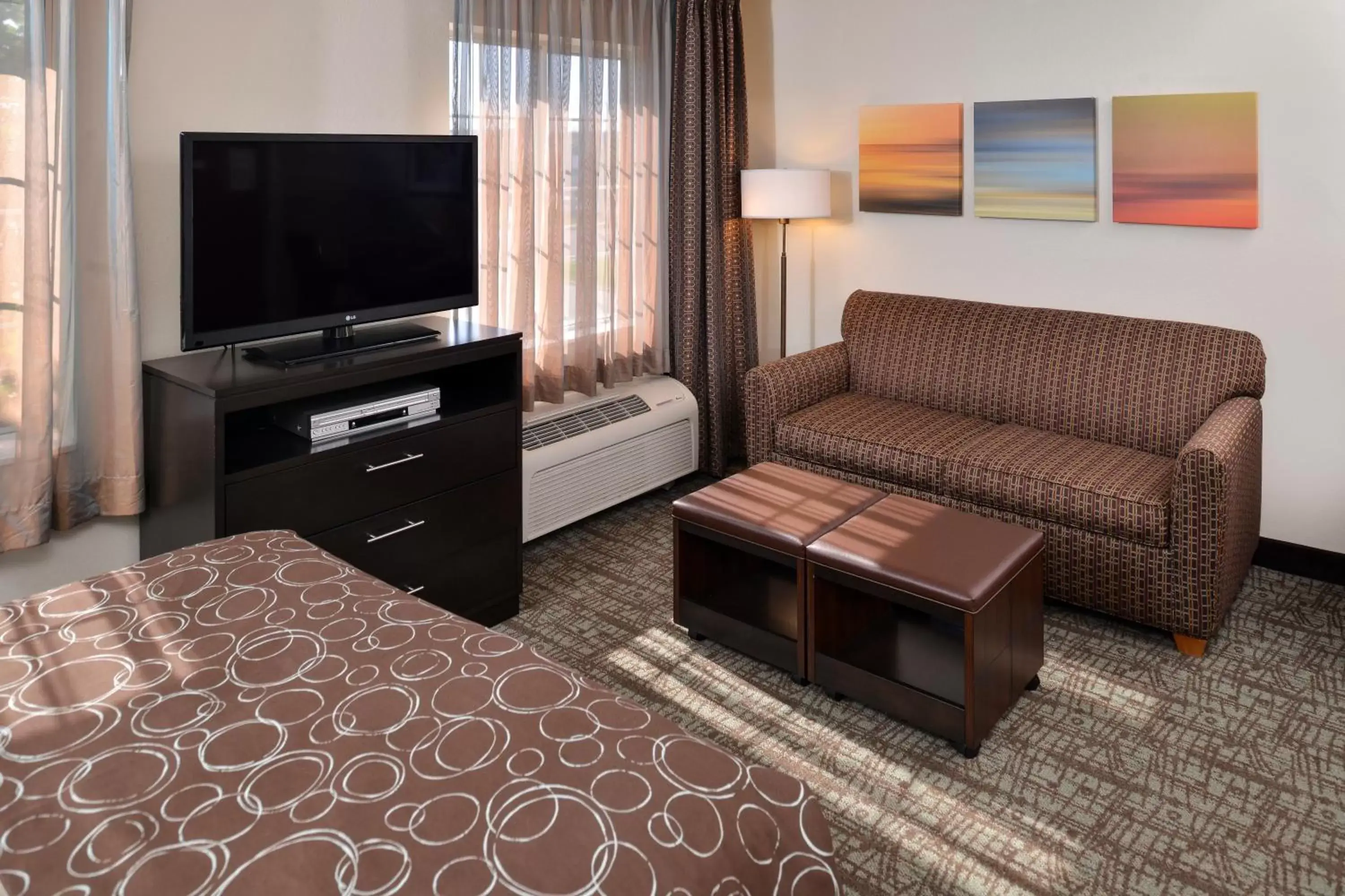 Photo of the whole room, TV/Entertainment Center in Staybridge Suites Sioux Falls at Empire Mall, an IHG Hotel