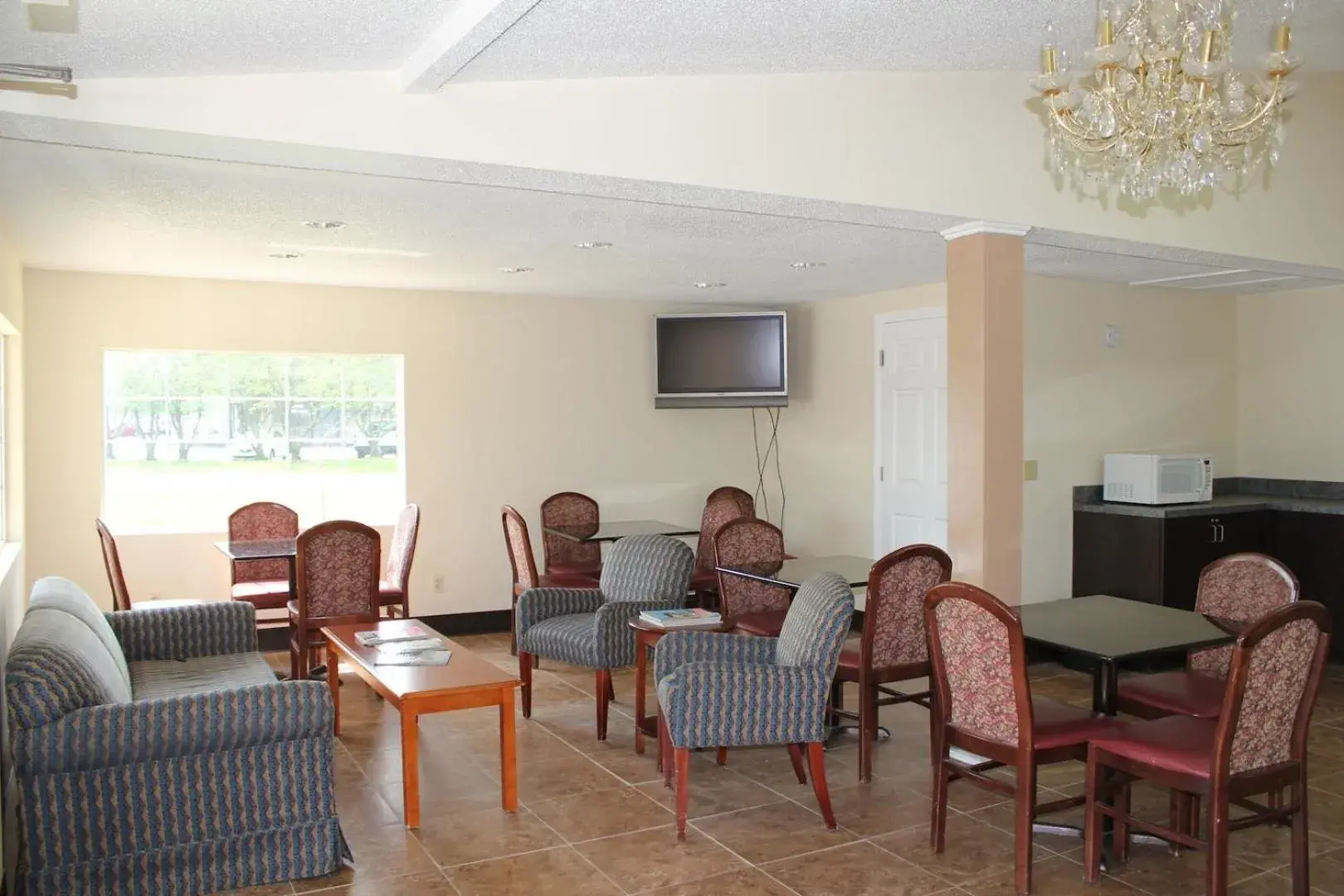 Communal lounge/ TV room, Seating Area in Somatel Goodlettsville