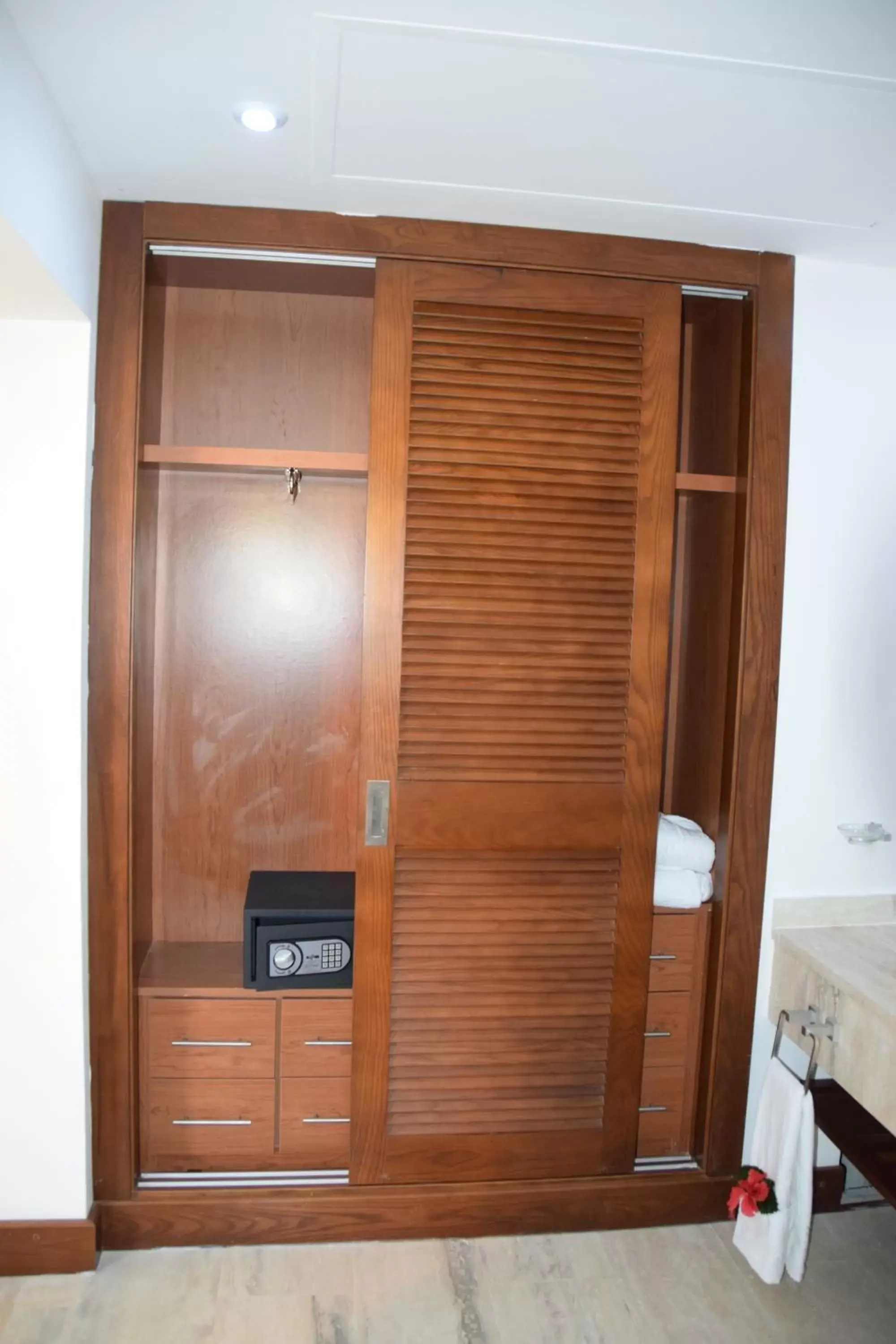 wardrobe, Bathroom in Sunset Boutique Hotel All Suites