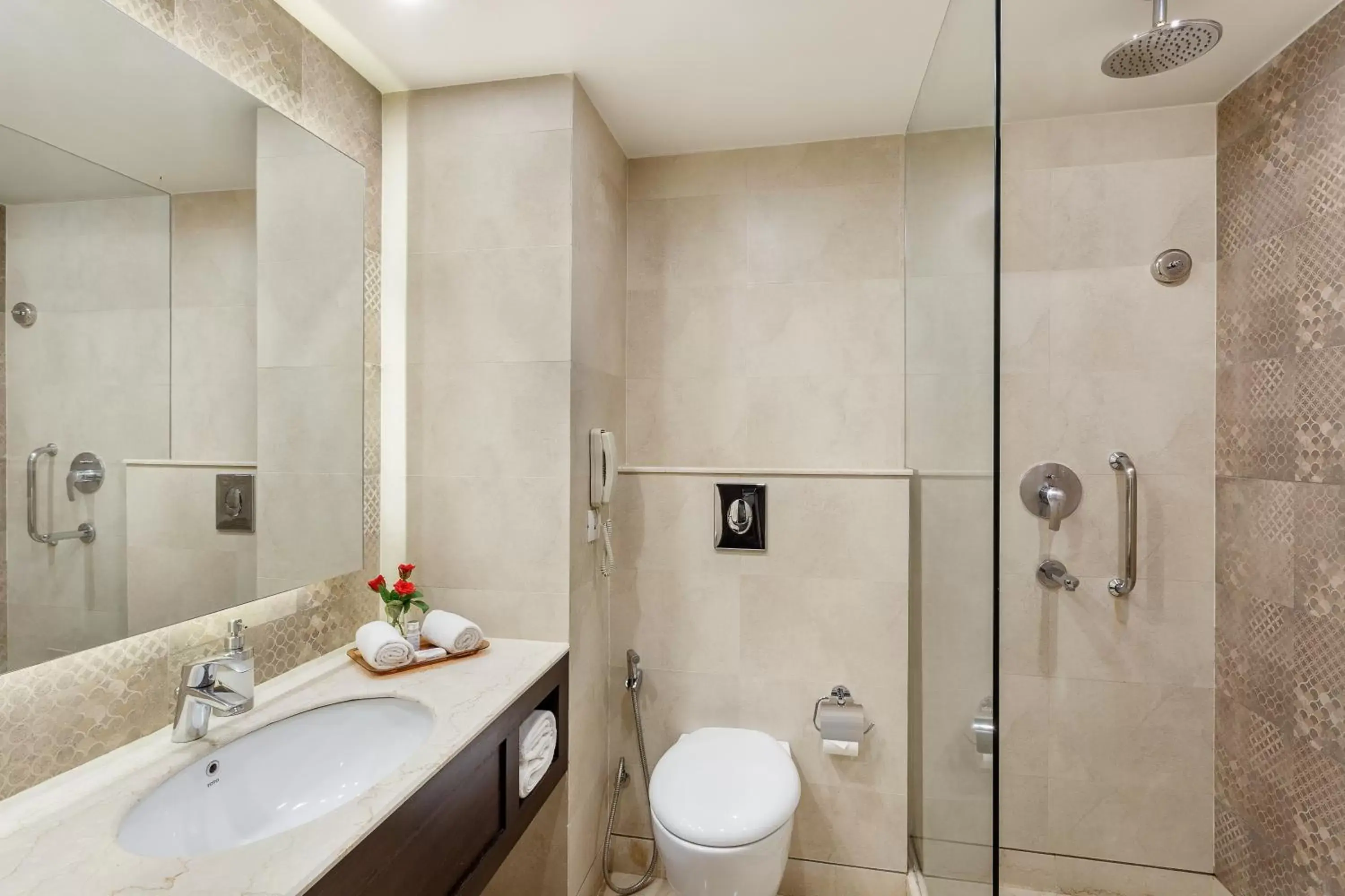 Bathroom in La Place Sarovar Portico