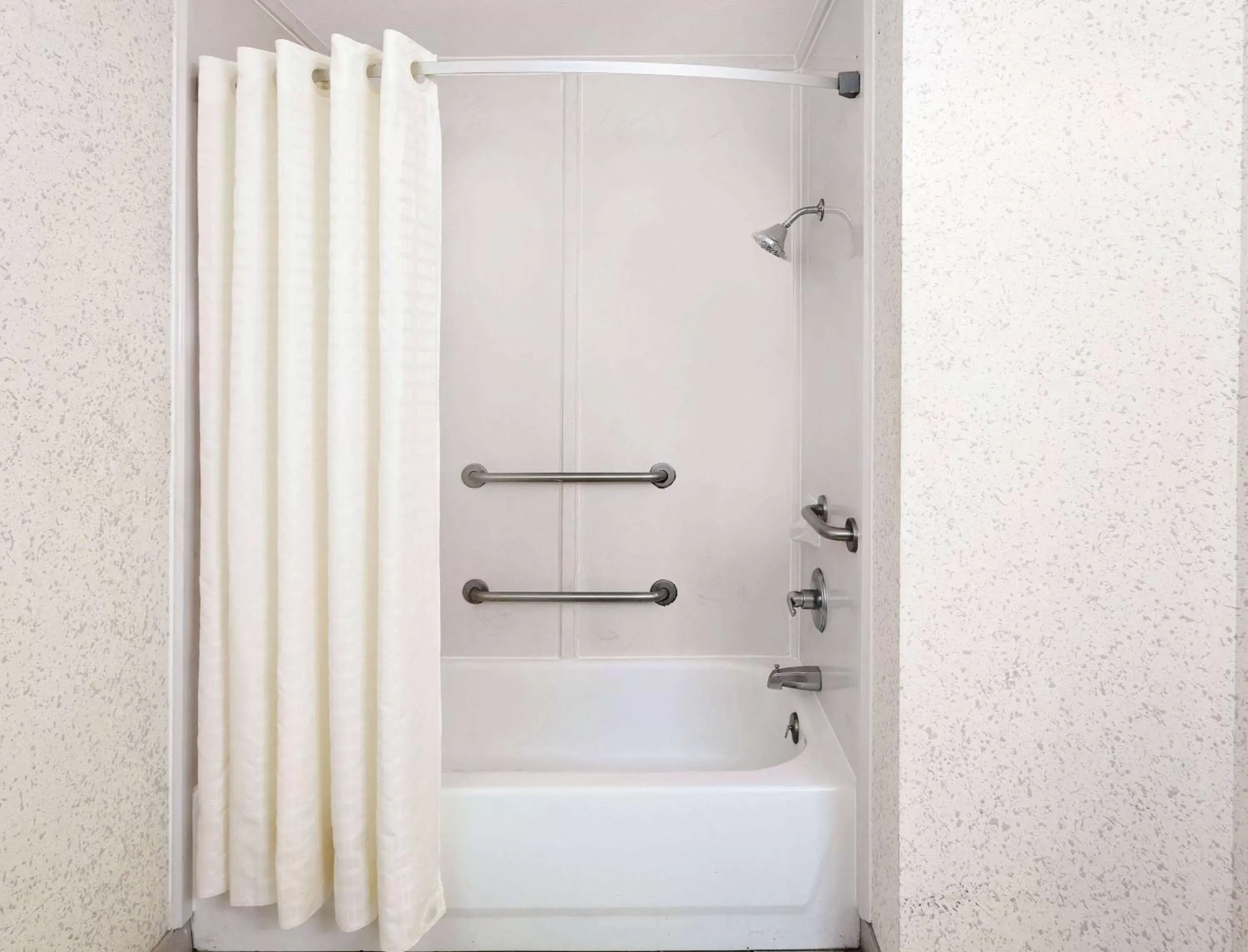 Shower, Bathroom in Days Inn & Suites by Wyndham Opelousas