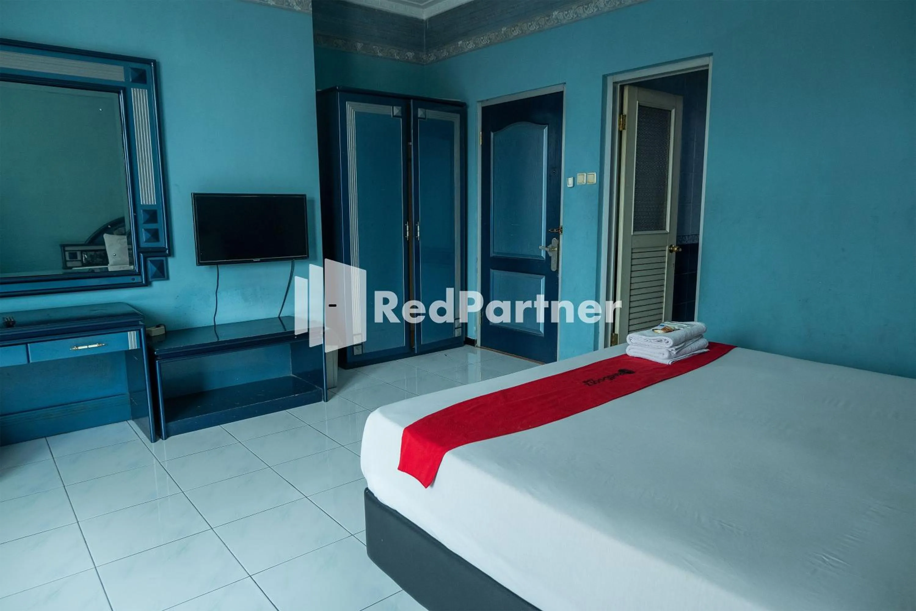 Bed in Akur Hotel Malioboro Mitra RedDoorz