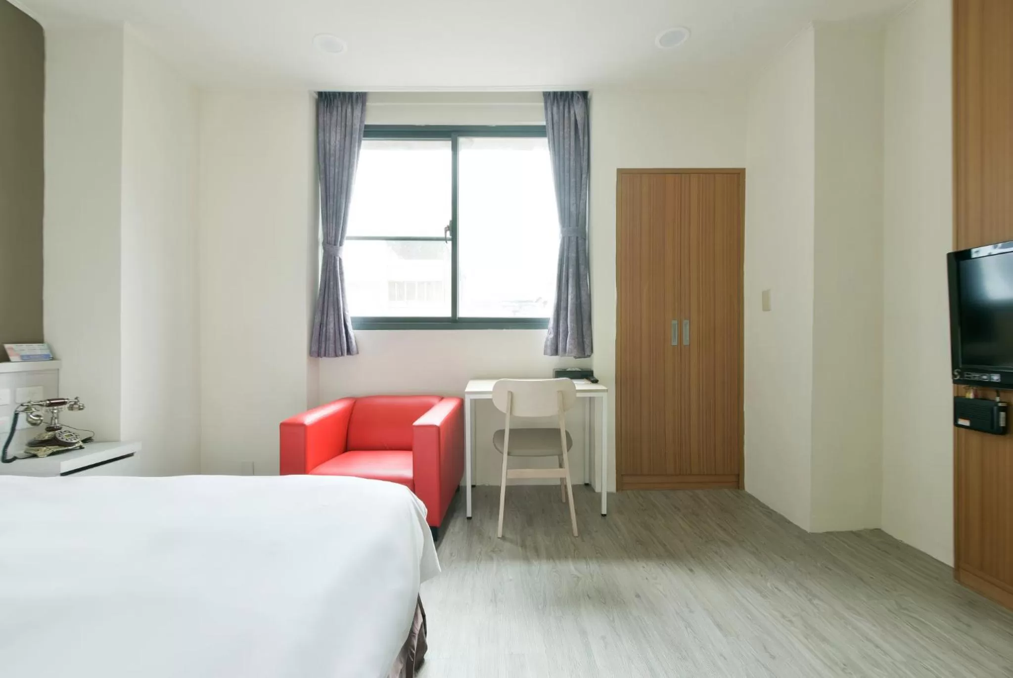 Bed in Raise Hotel Taichung