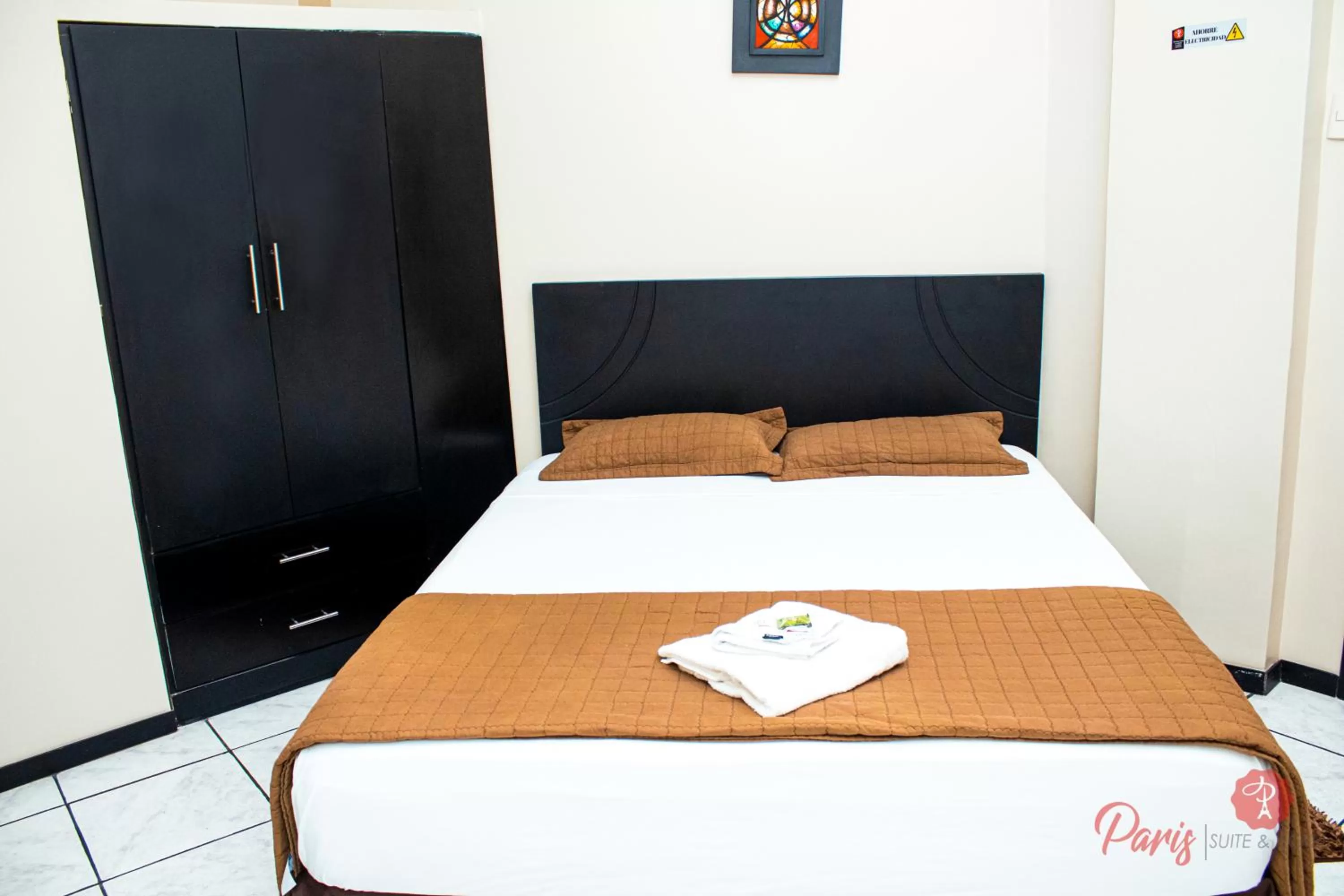 Bed in Paris Suite Hotel