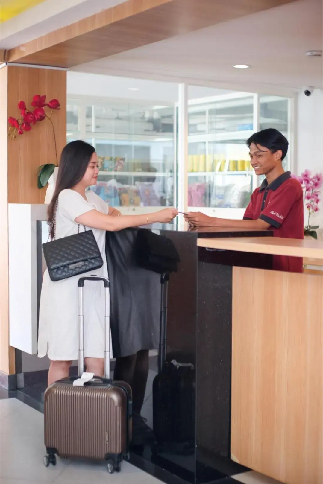 Lobby or reception in Red Orchid Hotel