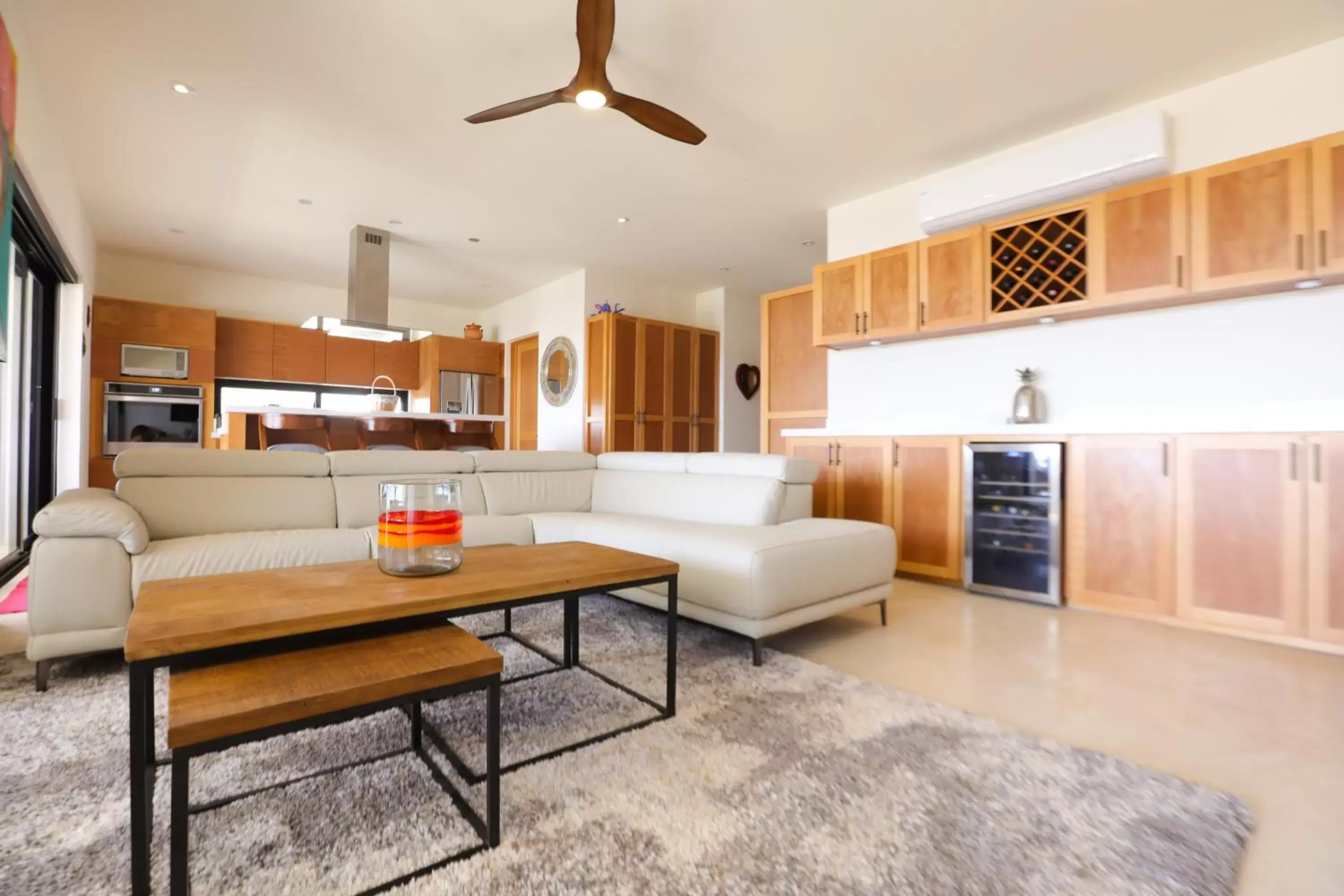 Living room, Kitchen/Kitchenette in Cerritos Surf Residences