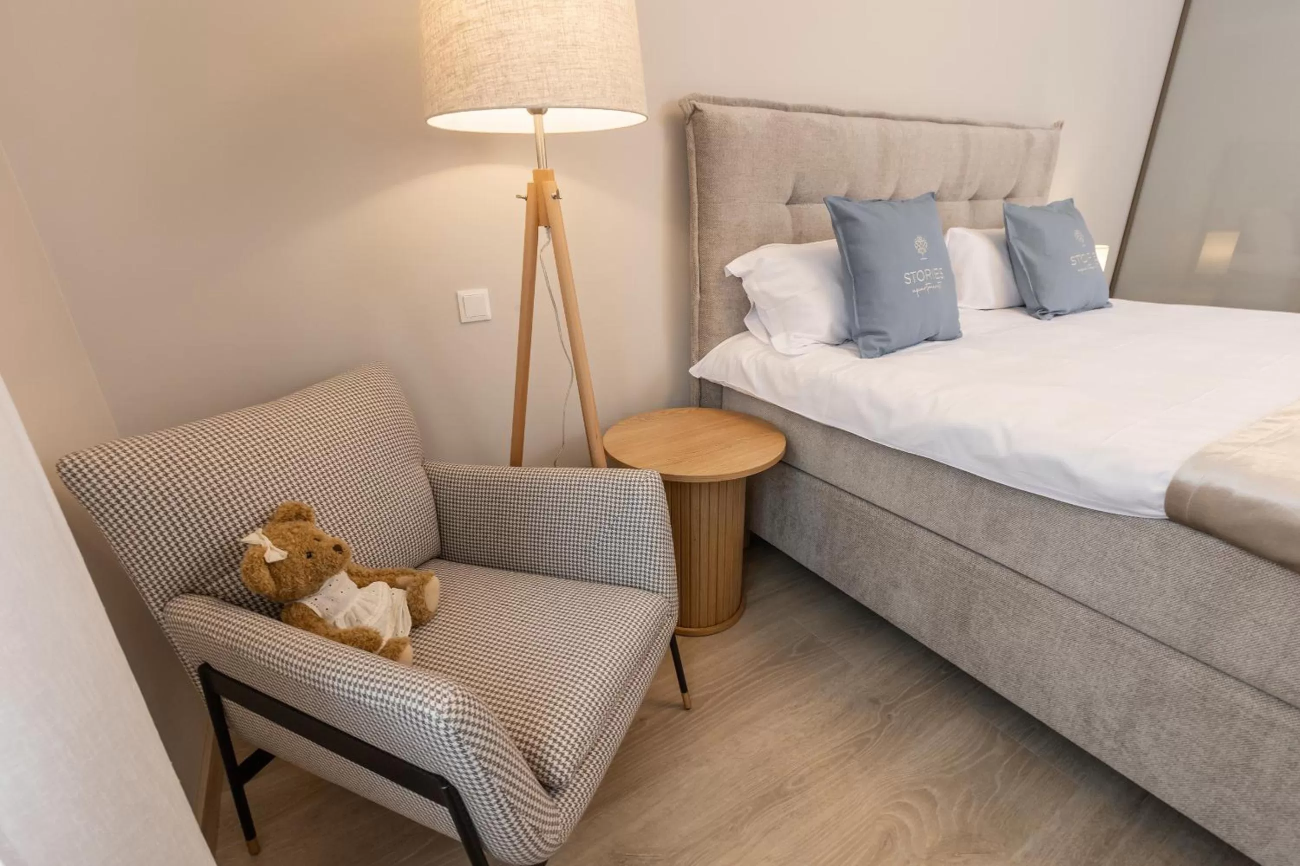 Bed in STORIES Design ApartHotel