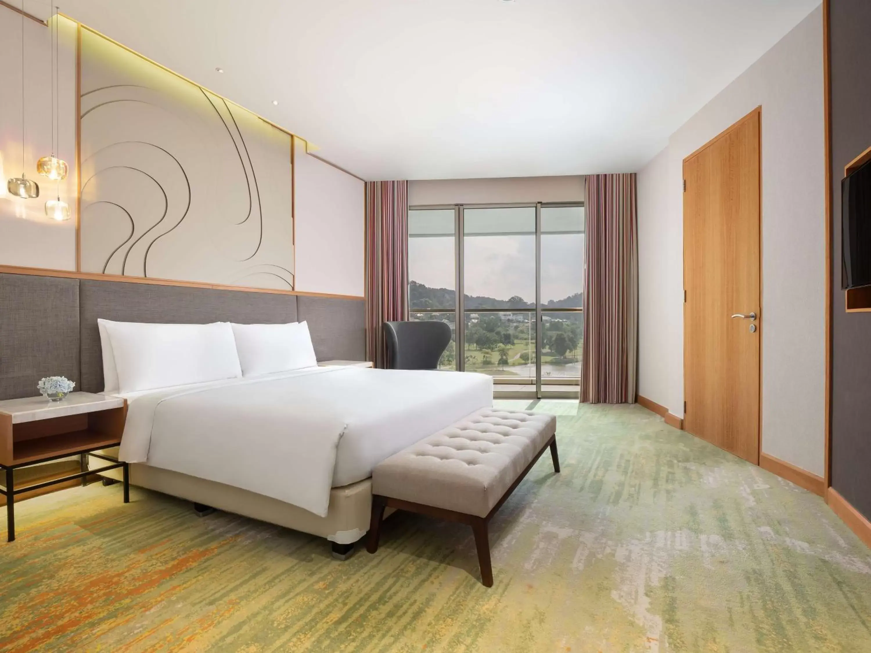 Photo of the whole room, Bed in Radisson Golf & Convention Center Batam