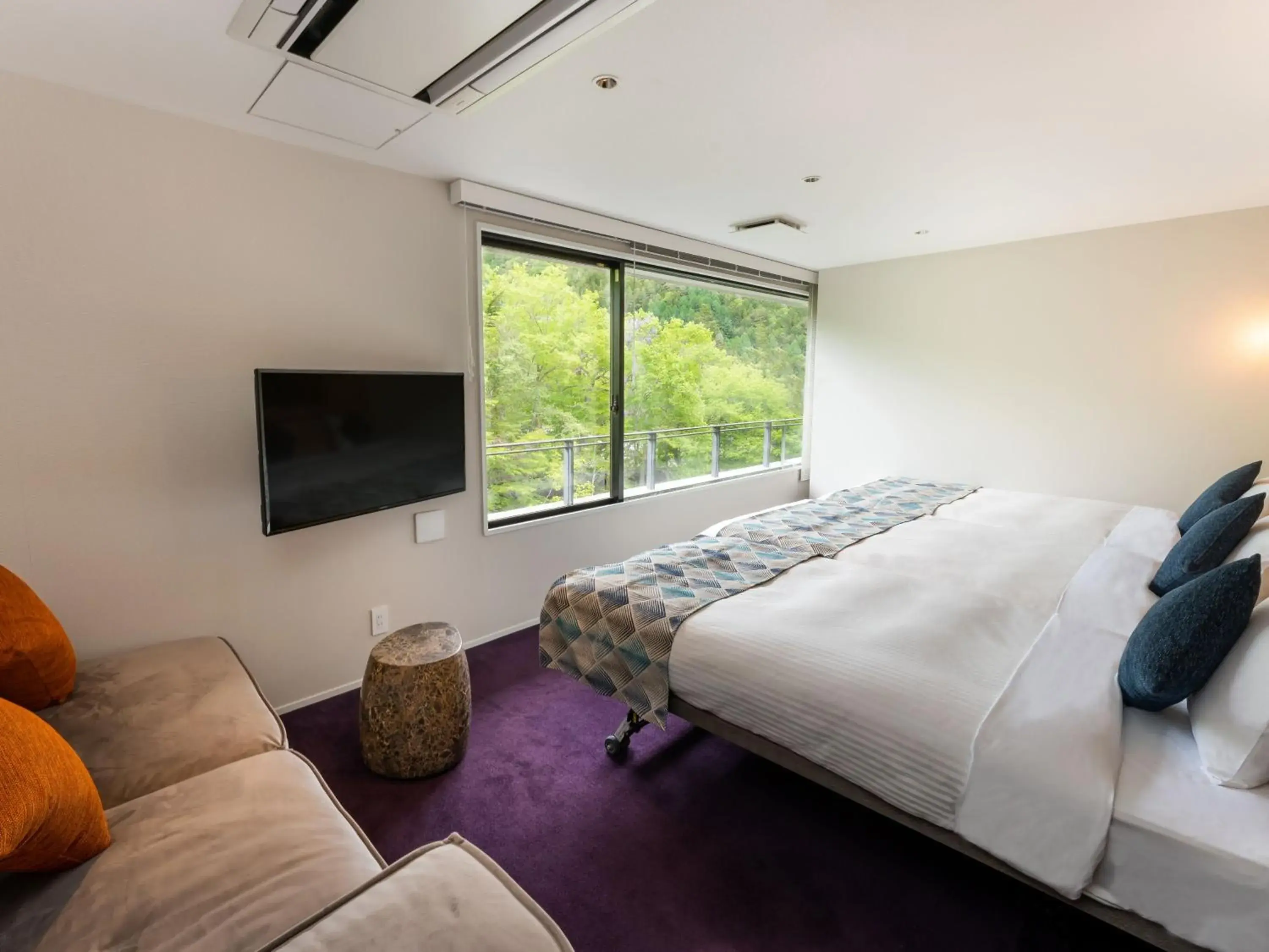 Bed in Kamenoi Hotel Nikko Yunishigawa