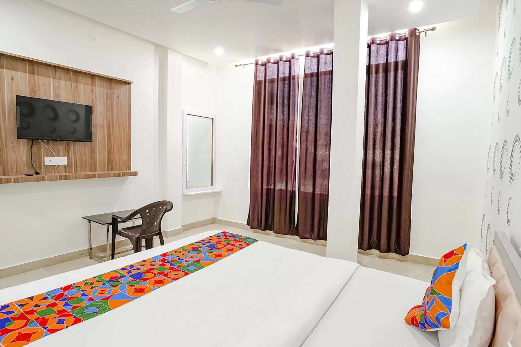 Bed in FabHotel Siddhi