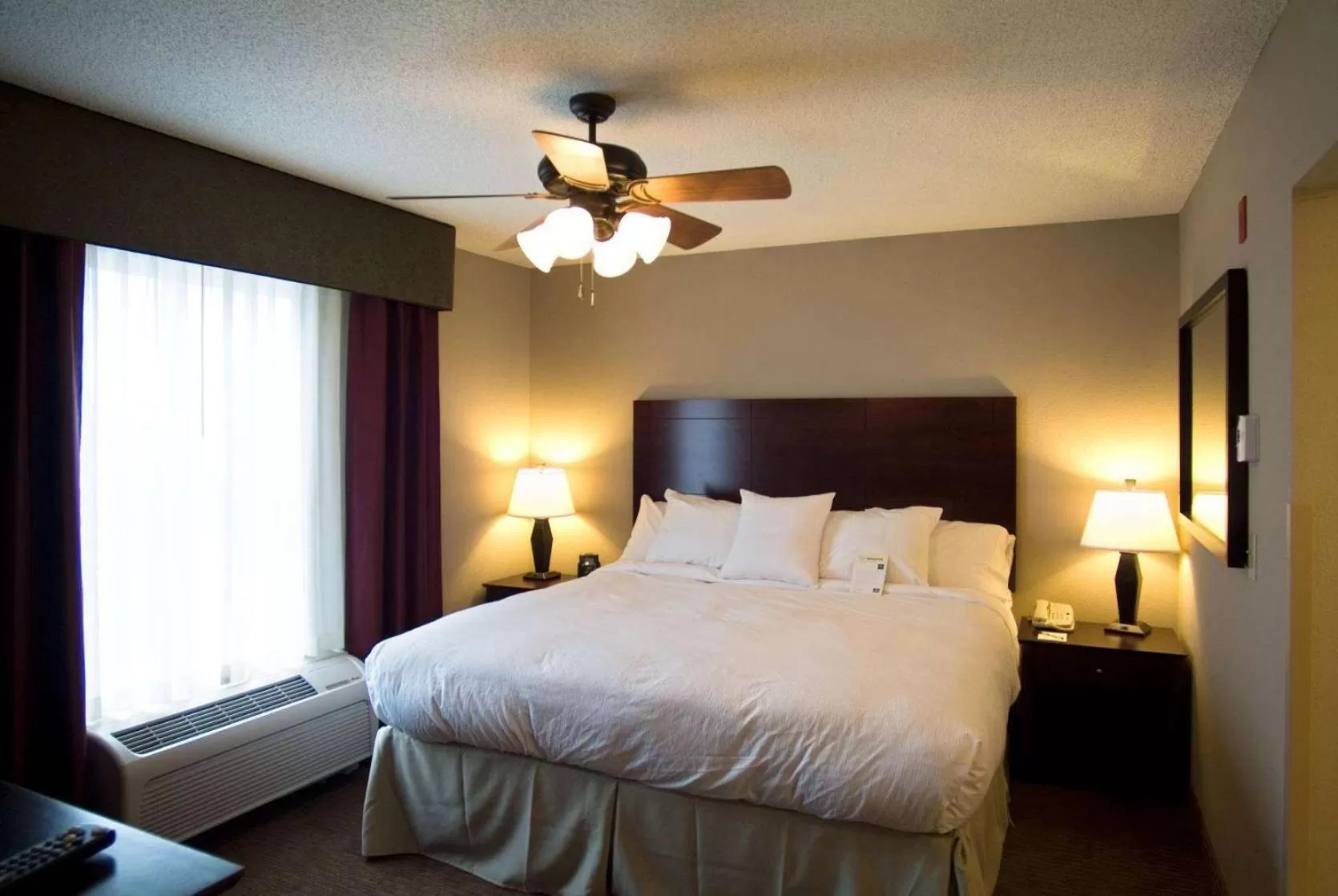 Bed in Homewood Suites by Hilton Bloomington