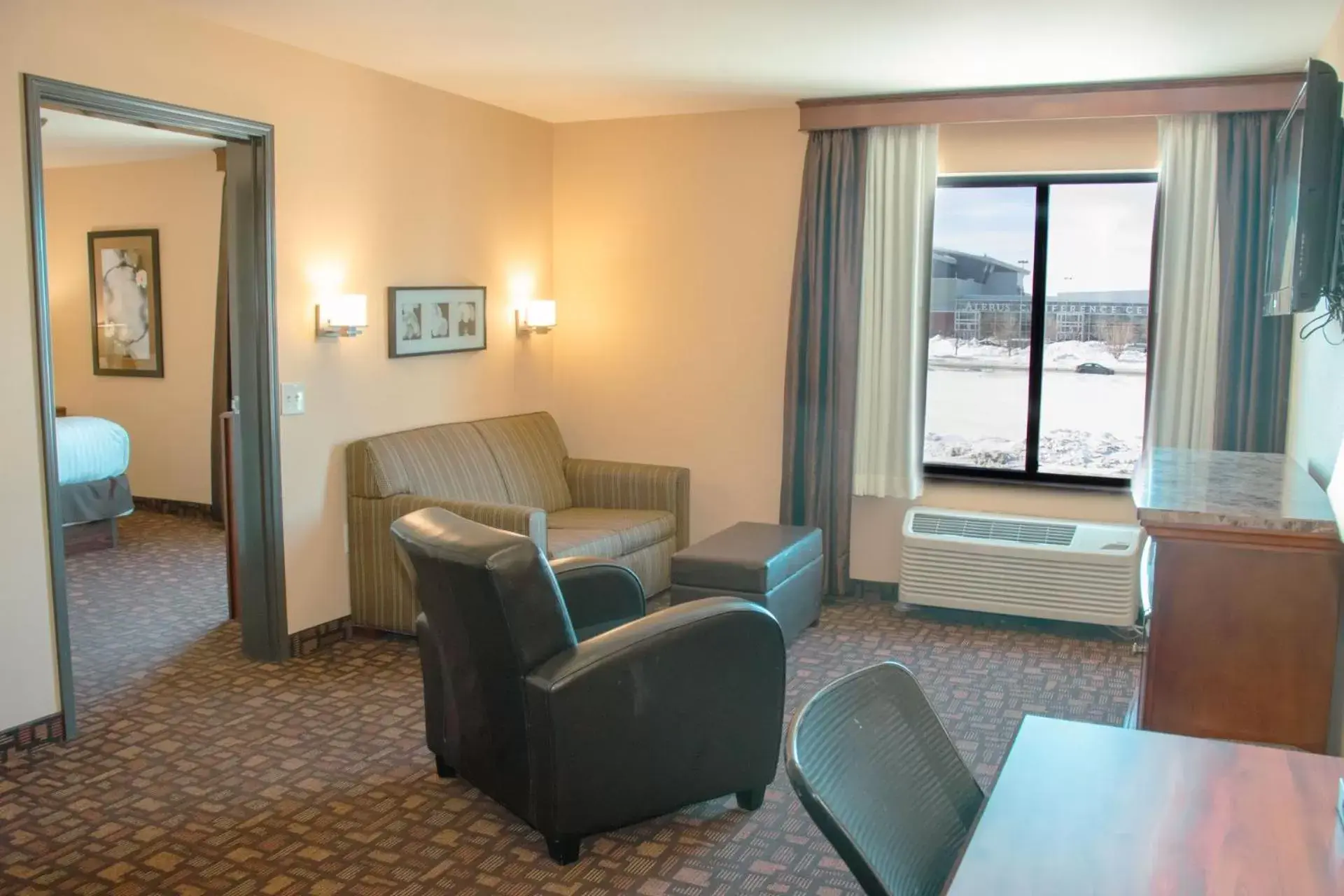 TV and multimedia, Seating Area in Expressway Suites of Grand Forks