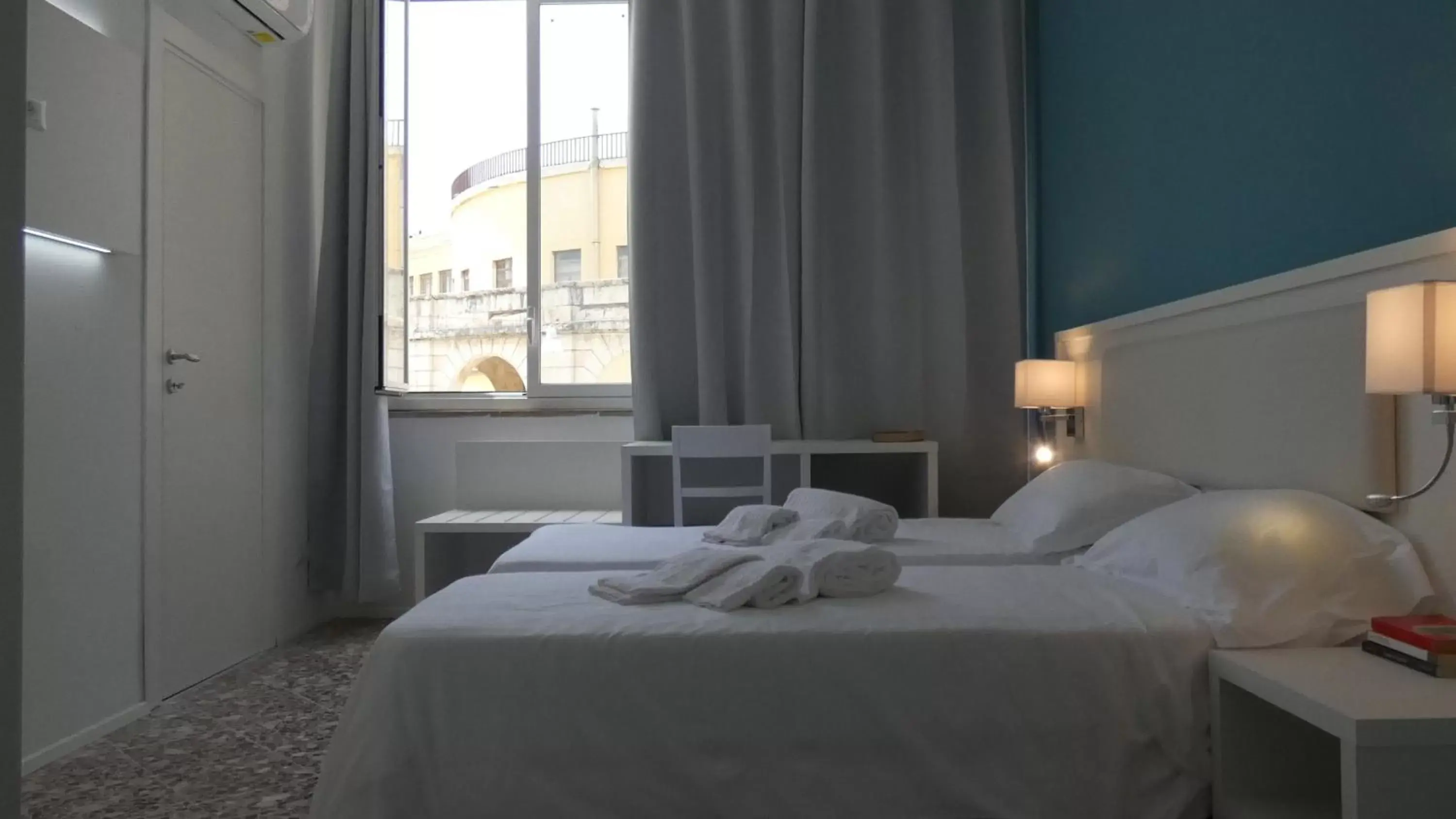 Bed in Regina Margherita - Bed and Breakfast & Rooftop Lounge Bar