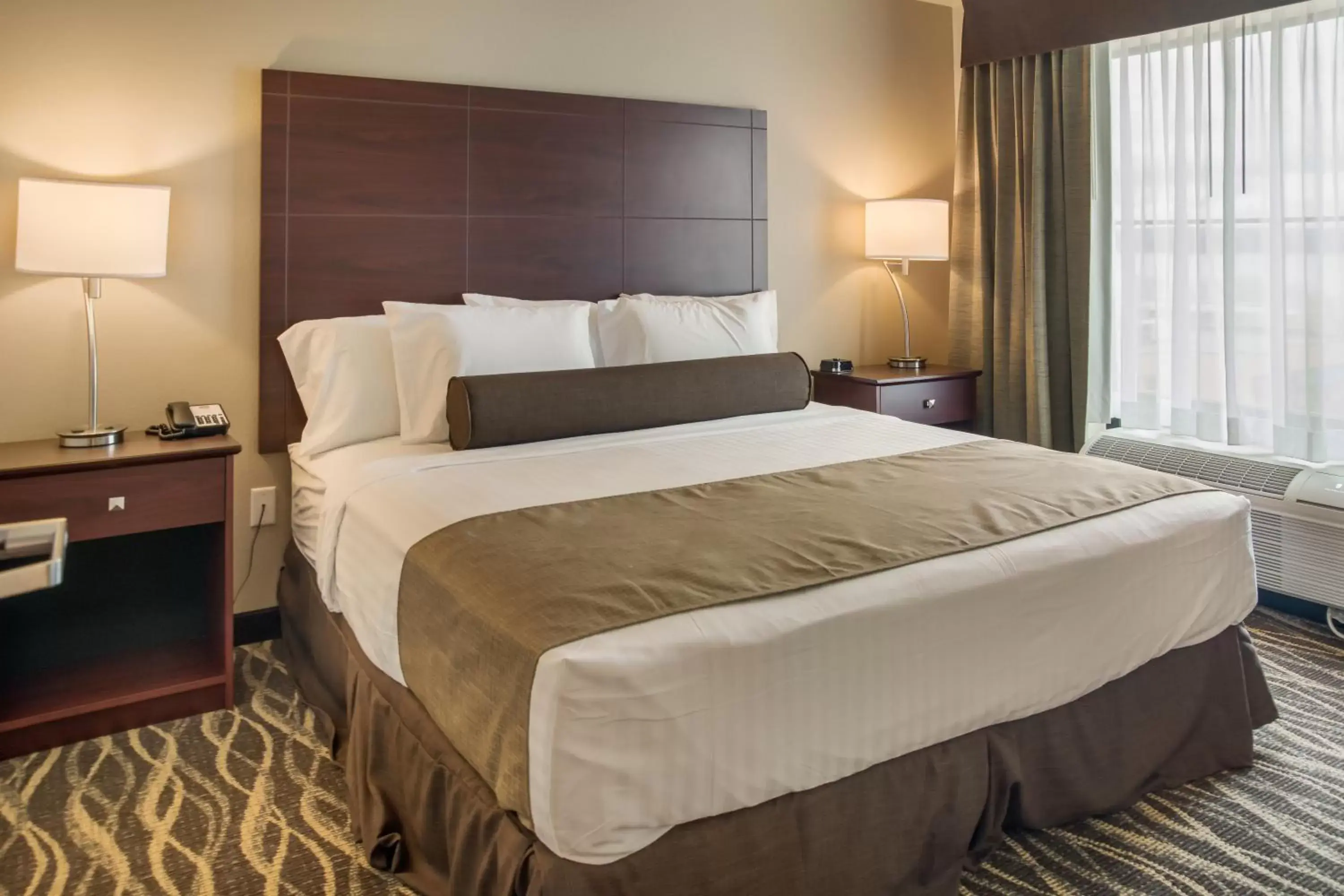 Bed in Cobblestone Inn & Suites - Menomonie/UW-Stout Bed in Cobblestone Inn & Suites - Menomonie/UW-Stout