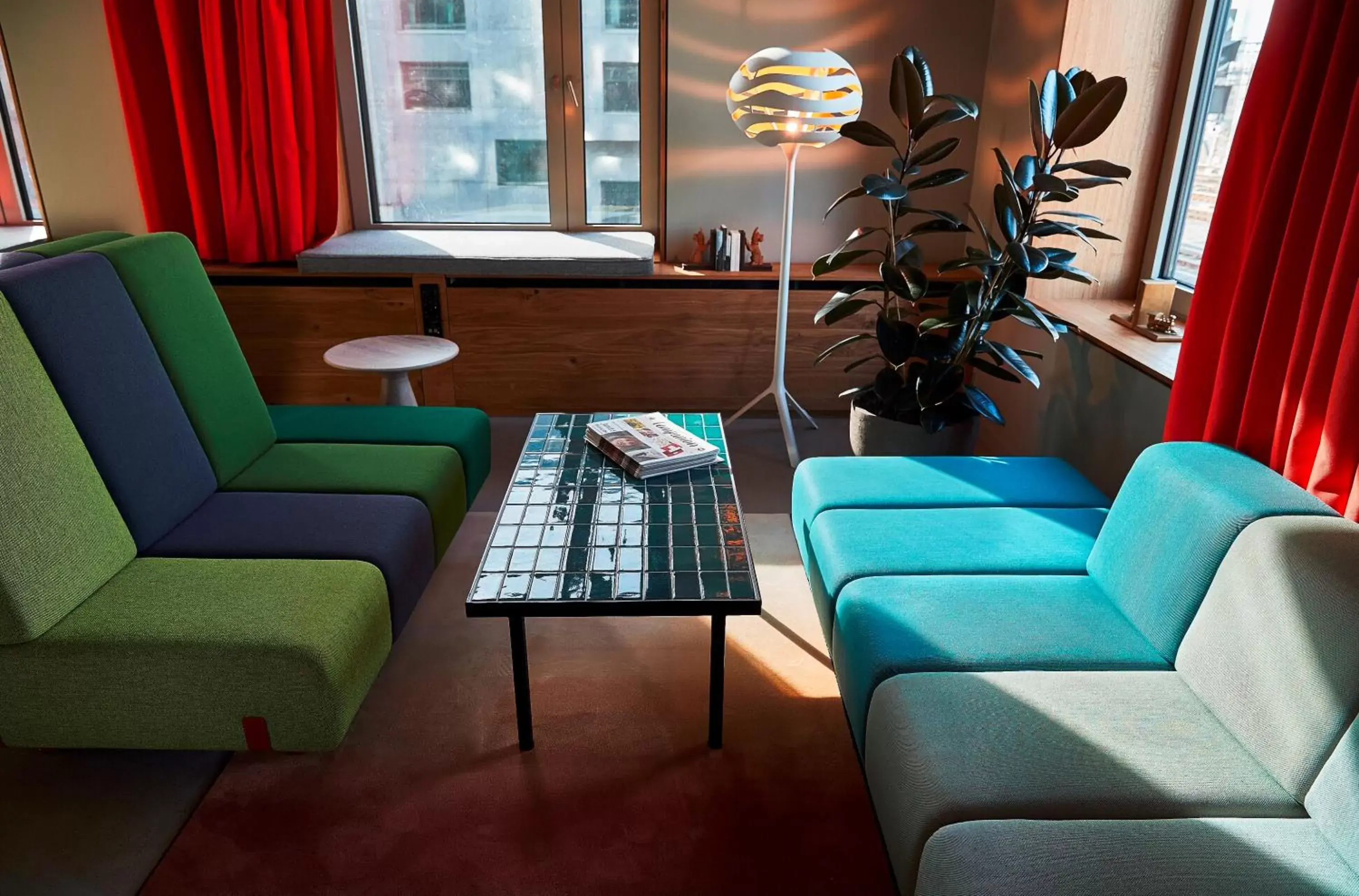 Communal lounge/ TV room in 25hours Hotel Langstrasse