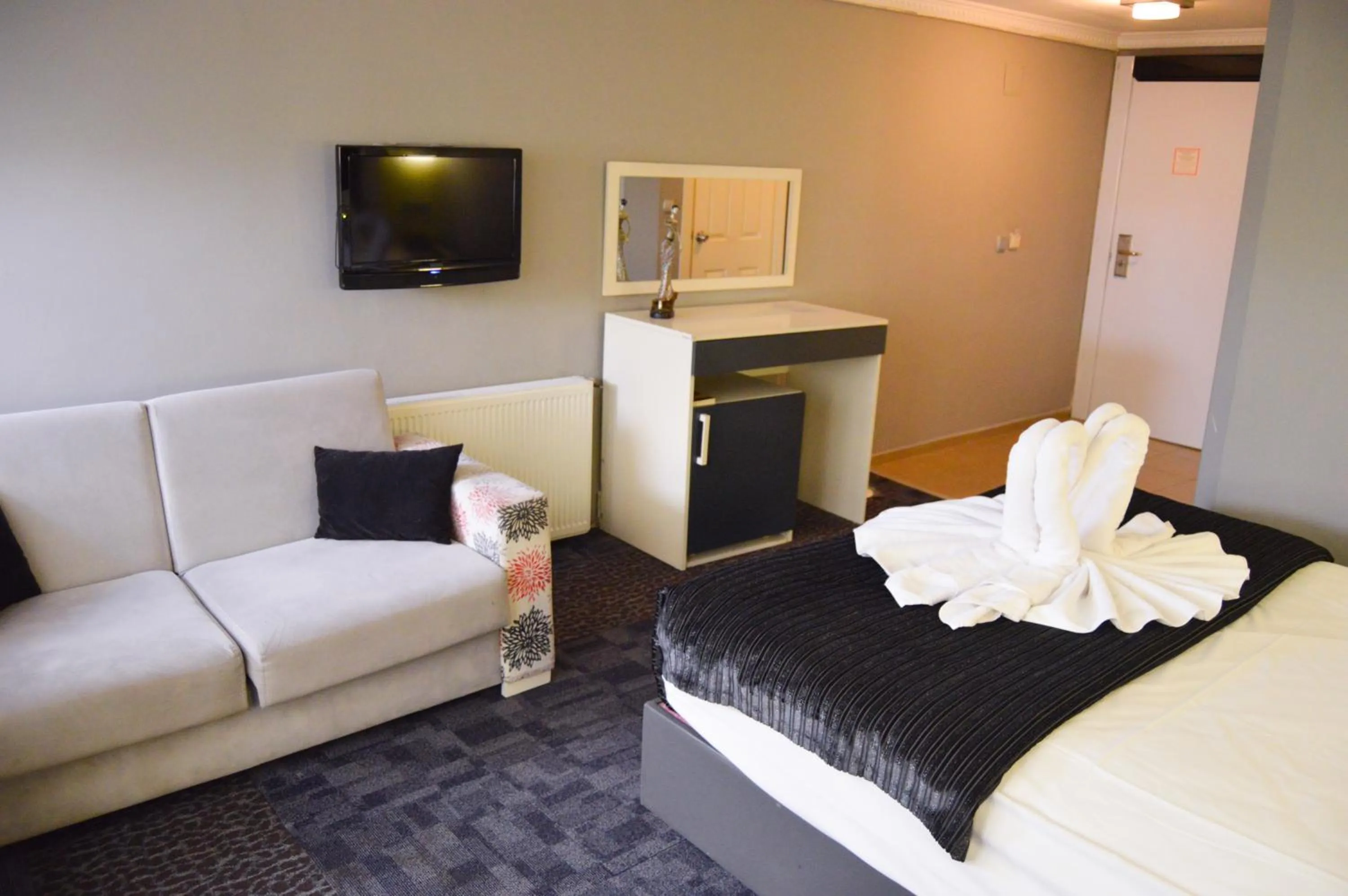 Living room, Bed in Comfort Downtown Istanbul