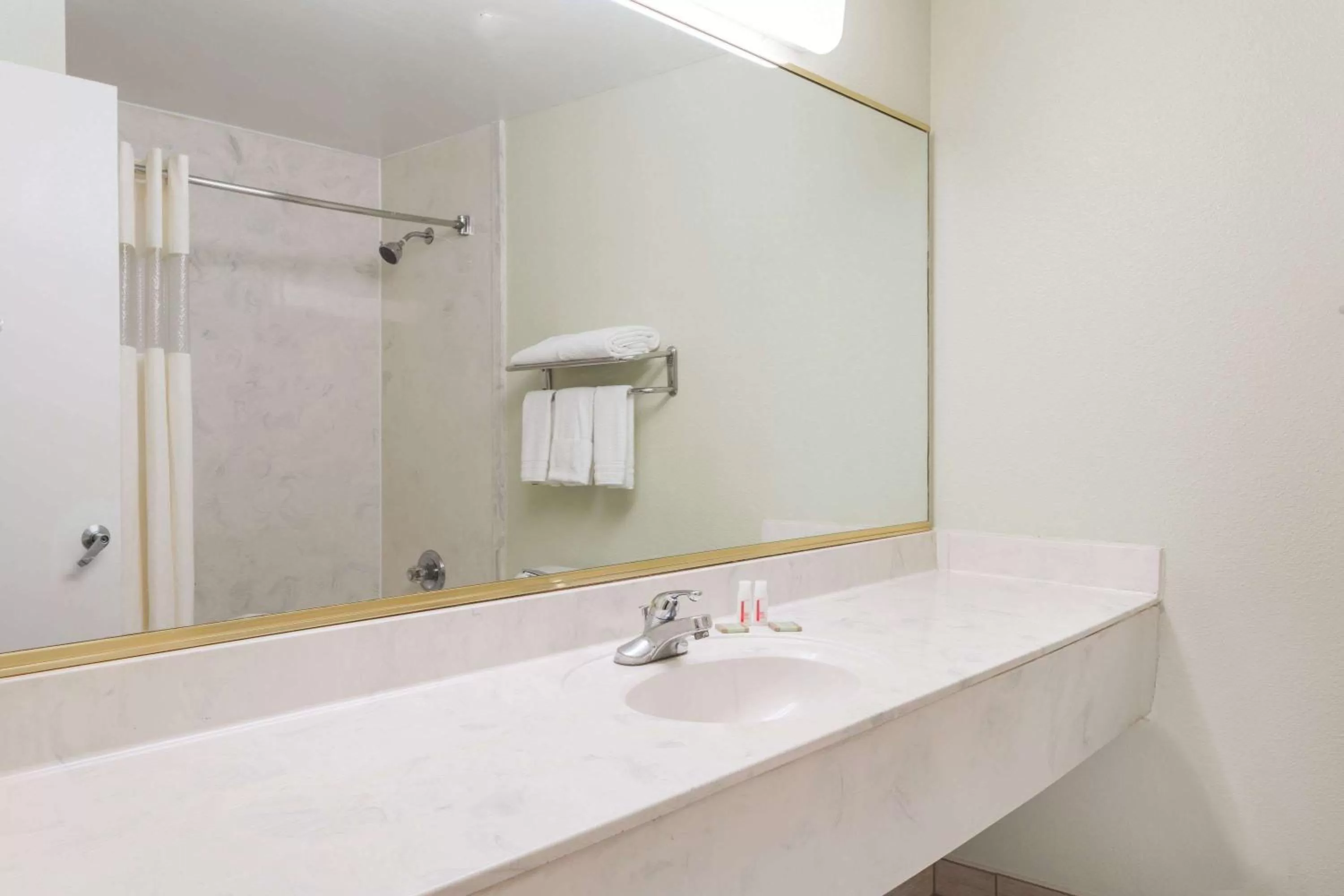 Bathroom in Super 8 by Wyndham Hull Street Midlothian Richmond Area