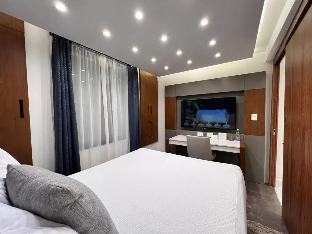 Bed in Seven Boutique Apartments Cancún