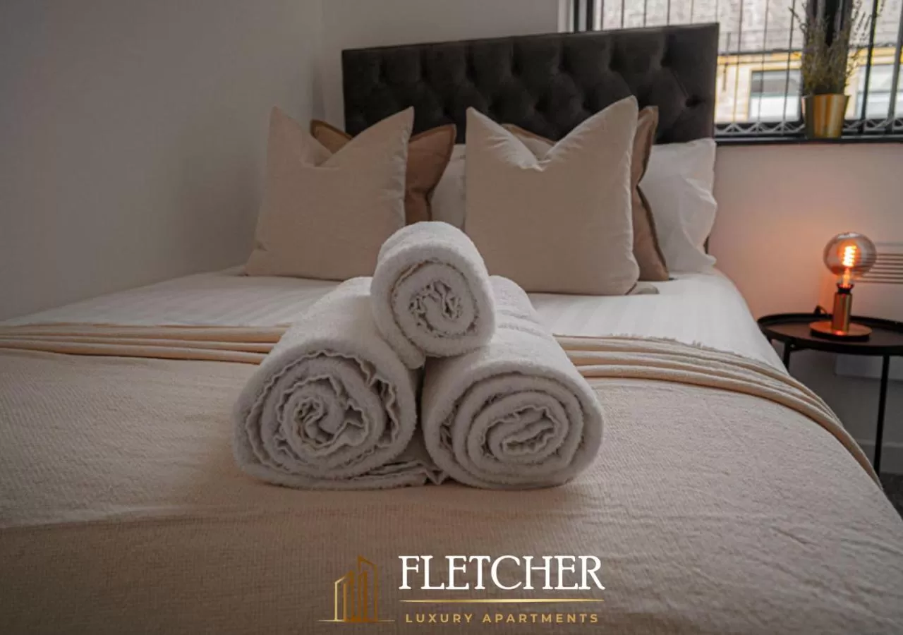 Bed in Spire Accommodations Ltd